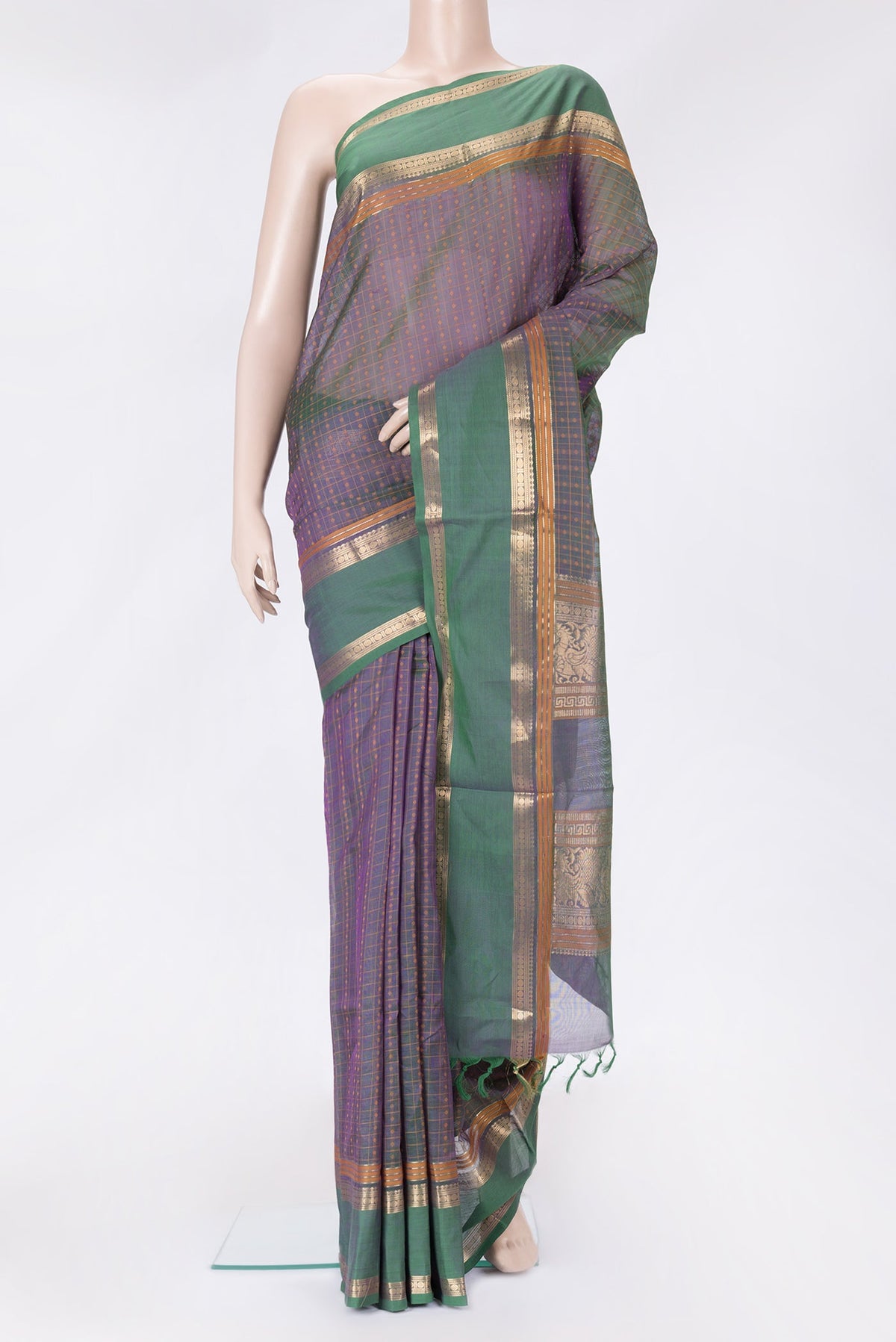 Green Dual Tone Silk Cotton Saree with Thread Butta on the body and Zari Border.  displayed on a mannequin