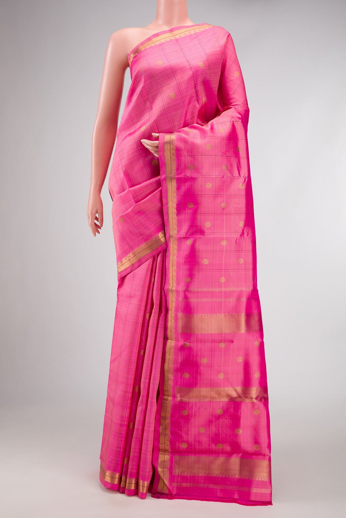 Pure Silk Pure Zari Pink Dual Tone Kanchipuram Saree with Checked design on the body and Zari Border.  displayed on a mannequin