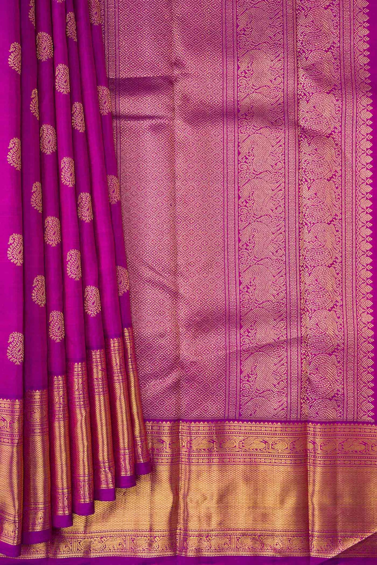 Pleats and pallu of Pure Silk Pure Zari Purple Dual Tone Kanjivaram Saree with Zari Butta on the body and Zari Border. 