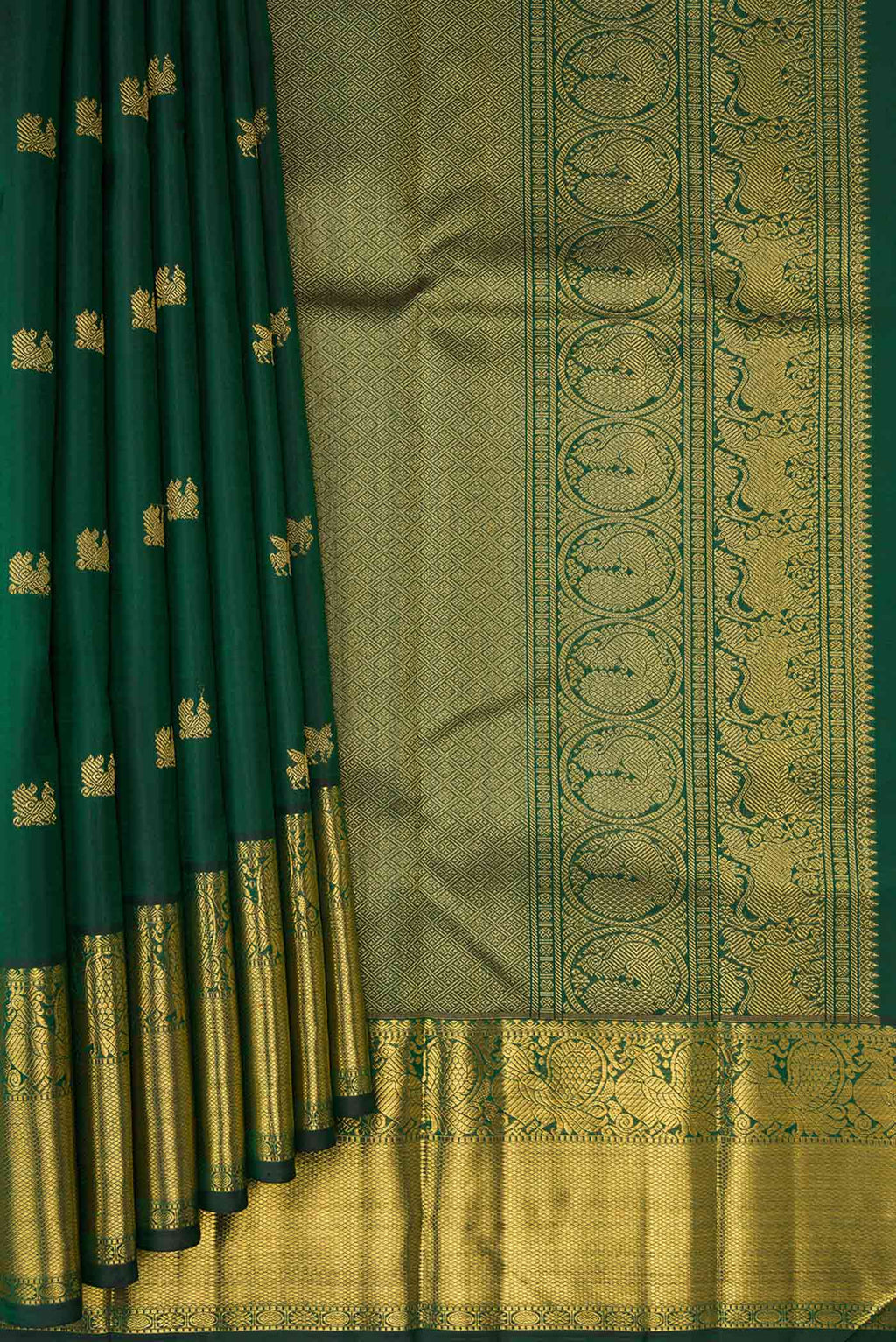 Pleats and pallu of Pure Silk Pure Zari Bottle Green Dual Tone Kanjivaram Saree with Zari Butta on the body and Zari Border. 