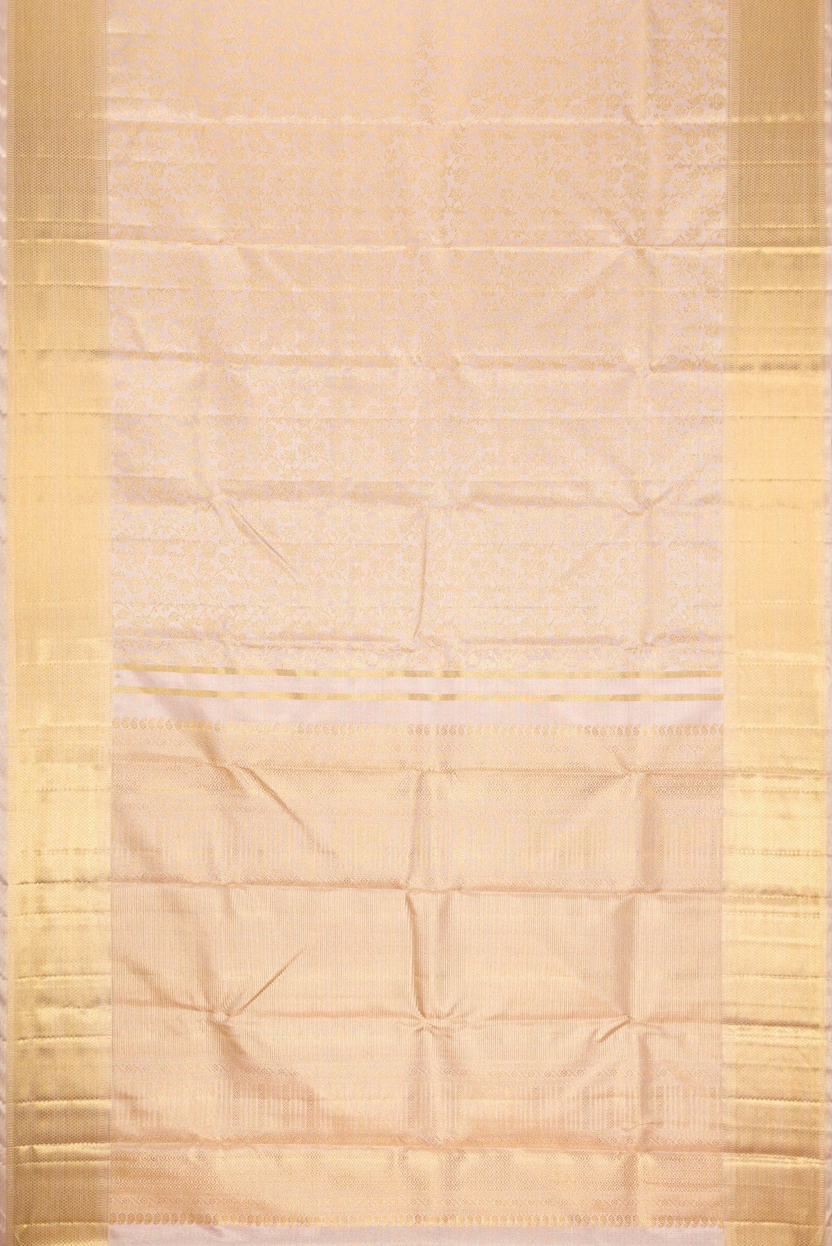 Flat view of Pure Silk Pure Zari Rose Gold Dual Tone Kanjivaram Tissue Saree with Zari Brocade on the body and Zari Border. 