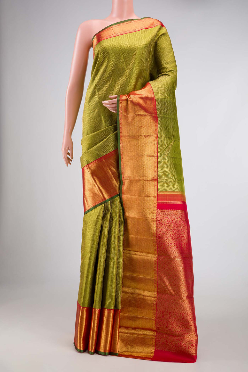 Pure Silk Pure Zari Green Dual Tone Kanchipuram Saree with Zari Brocade on the body and Zari Border displayed on a mannequin