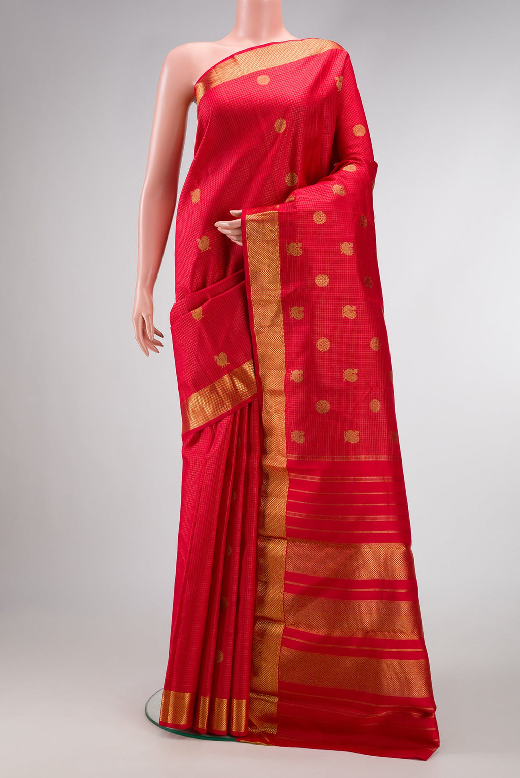 Pure Silk Pure Zari Dark Pink Dual Tone Kanjivaram Saree with Zari Butta on the body and Zari Border.  displayed on a mannequin