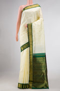 Sandal Dual Tone Kanchipuram Silk Saree with Zari Butta on the body and Zari Border displayed on a mannequin