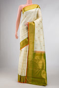 Pure Silk Pure Zari Sandal Dual Tone Kanchipuram Saree with Checked design on the body and Zari Border displayed on a mannequin