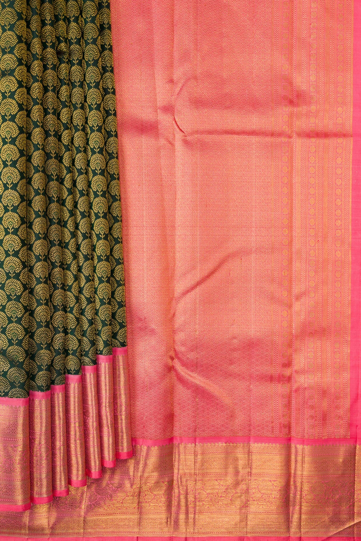 Pleats and pallu of Bottle Green Dual Tone Kanjivaram Silk Saree with Zari Brocade on the body and Zari Border. 