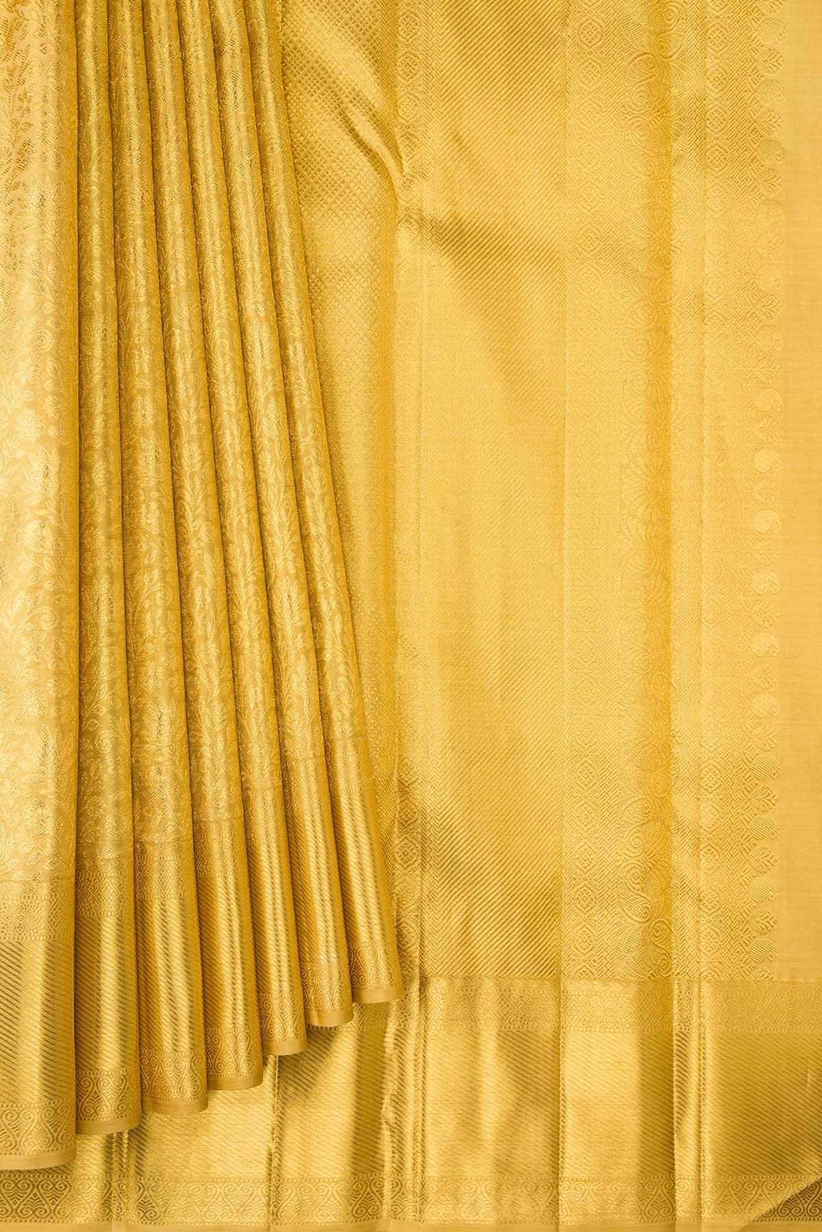 Pleats and pallu of Pure Silk Pure Zari Gold Dual Tone Kanjivaram Tissue Saree with Zari Brocade on the body and Zari Border. 