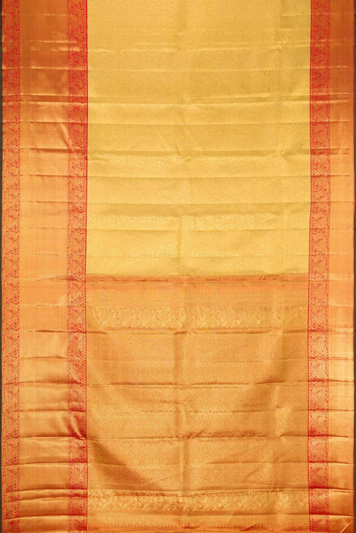 Flat view of Pure Silk Pure Zari Gold Dual Tone Kanjivaram Tissue Saree with Zari Brocade on the body and Zari Border. 