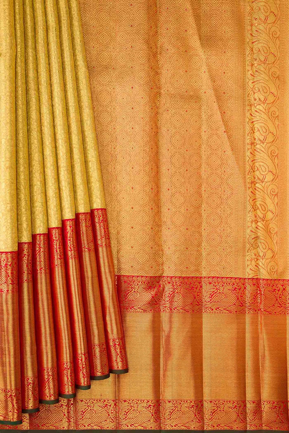 Pleats and pallu of Pure Silk Pure Zari Gold Dual Tone Kanjivaram Tissue Saree with Zari Brocade on the body and Zari Border. 