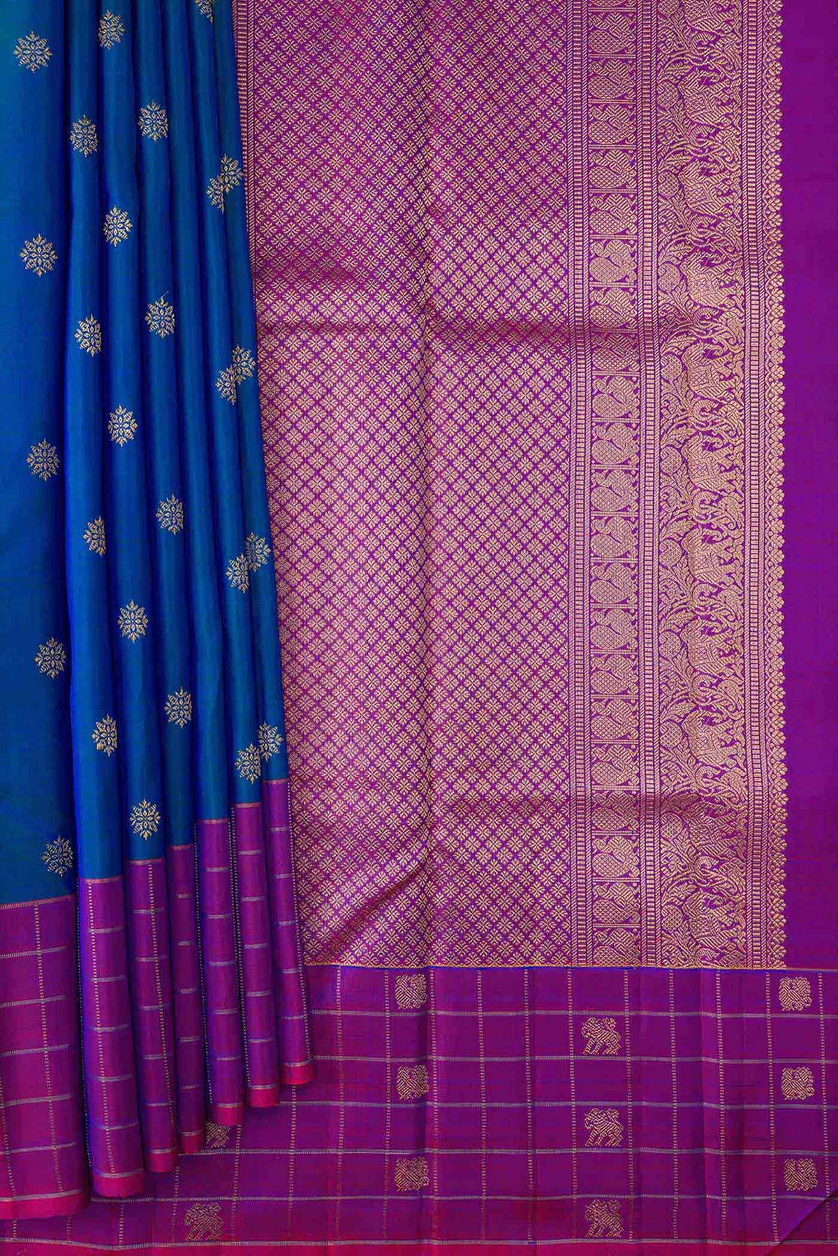 Pleats and pallu of Pure Silk Pure Zari Peacock Blue Dual Tone Kanchipuram Saree with Zari Butta on the body and Zari Border
