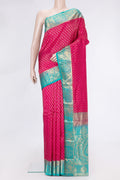 Pink Dual Tone Kanchipuram Silk Saree with Zari Butta on the body and Zari Border.  displayed on a mannequin