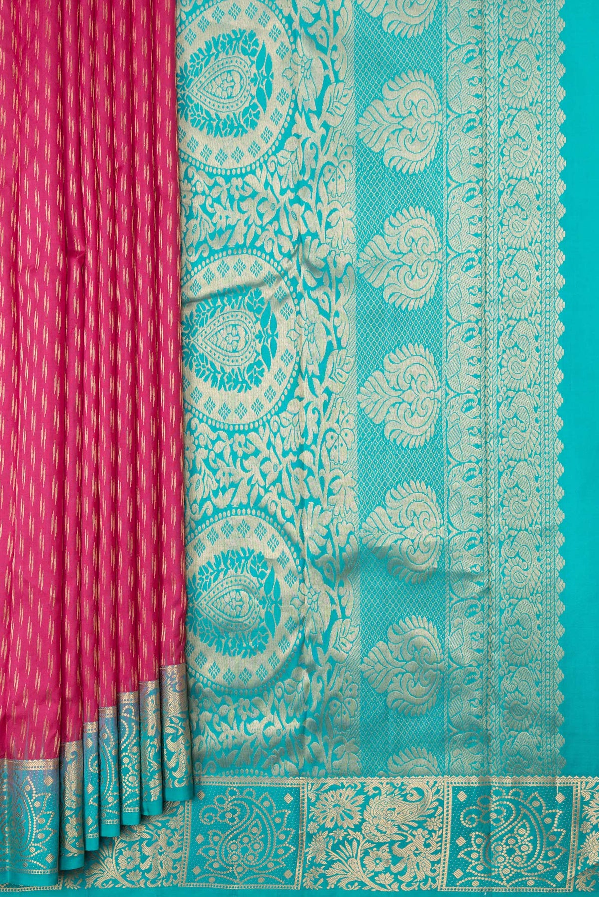 Pleats and pallu of Pink Dual Tone Kanchipuram Silk Saree with Zari Butta on the body and Zari Border. 