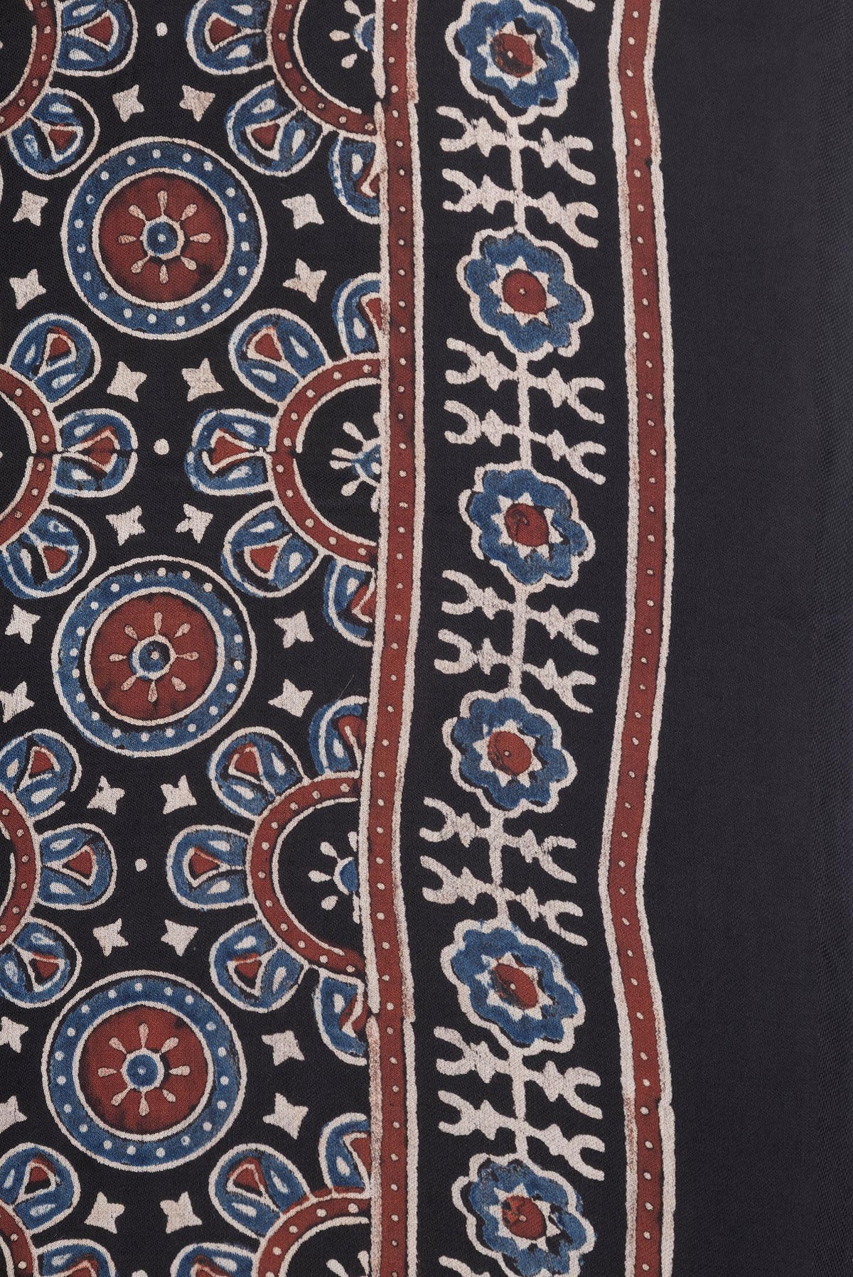 Border image of Black Dual Tone Crepe Saree with Ajrakh Print on the body and Printed Border. 