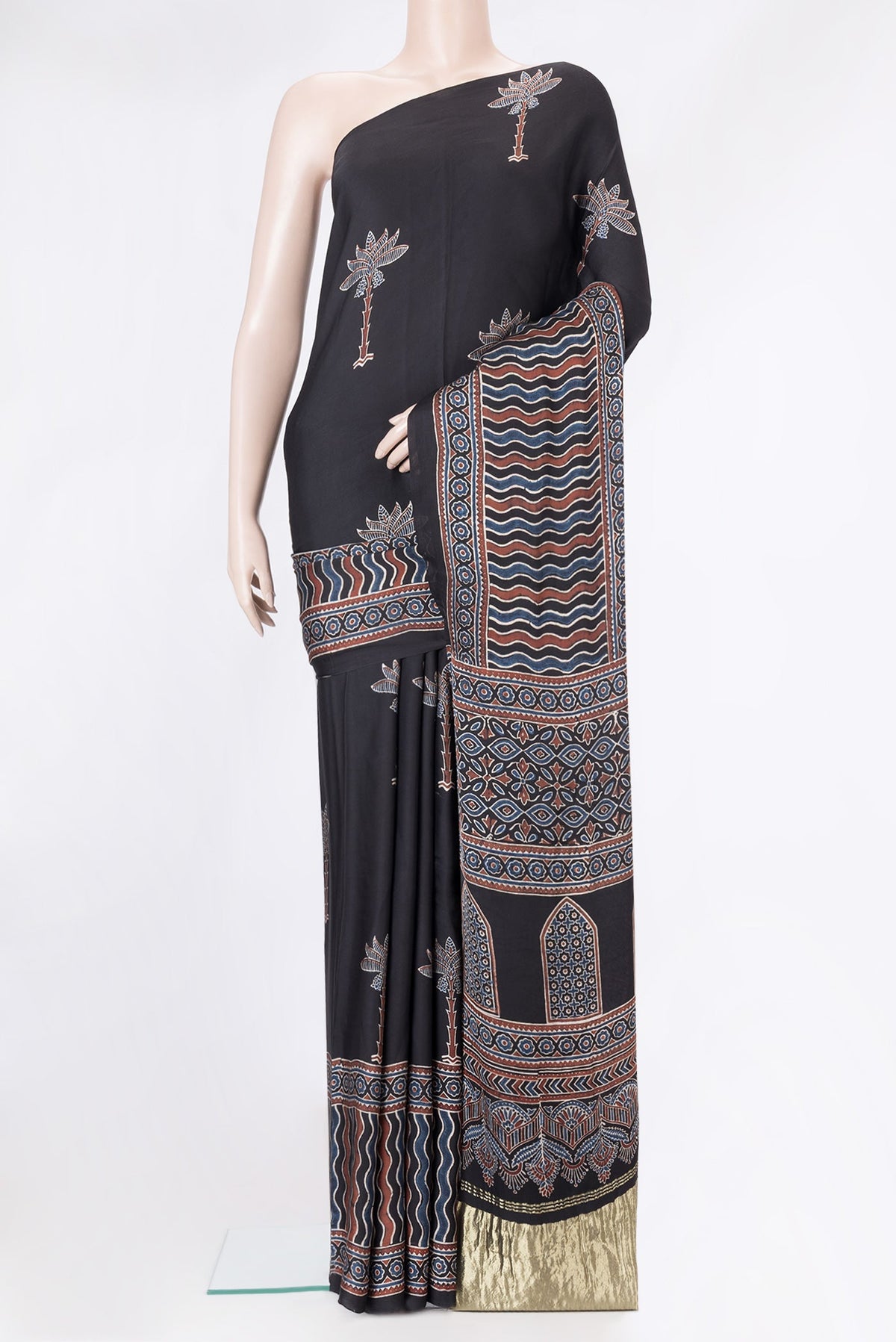 Black Dual Tone Blended Crepe Saree with Ajrakh Print on the body and Printed Border.  displayed on a mannequin