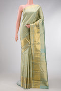 Pista Green Dual Tone Kanchipuram Silk Saree with Zari Brocade on the body and Zari Border.  displayed on a mannequin