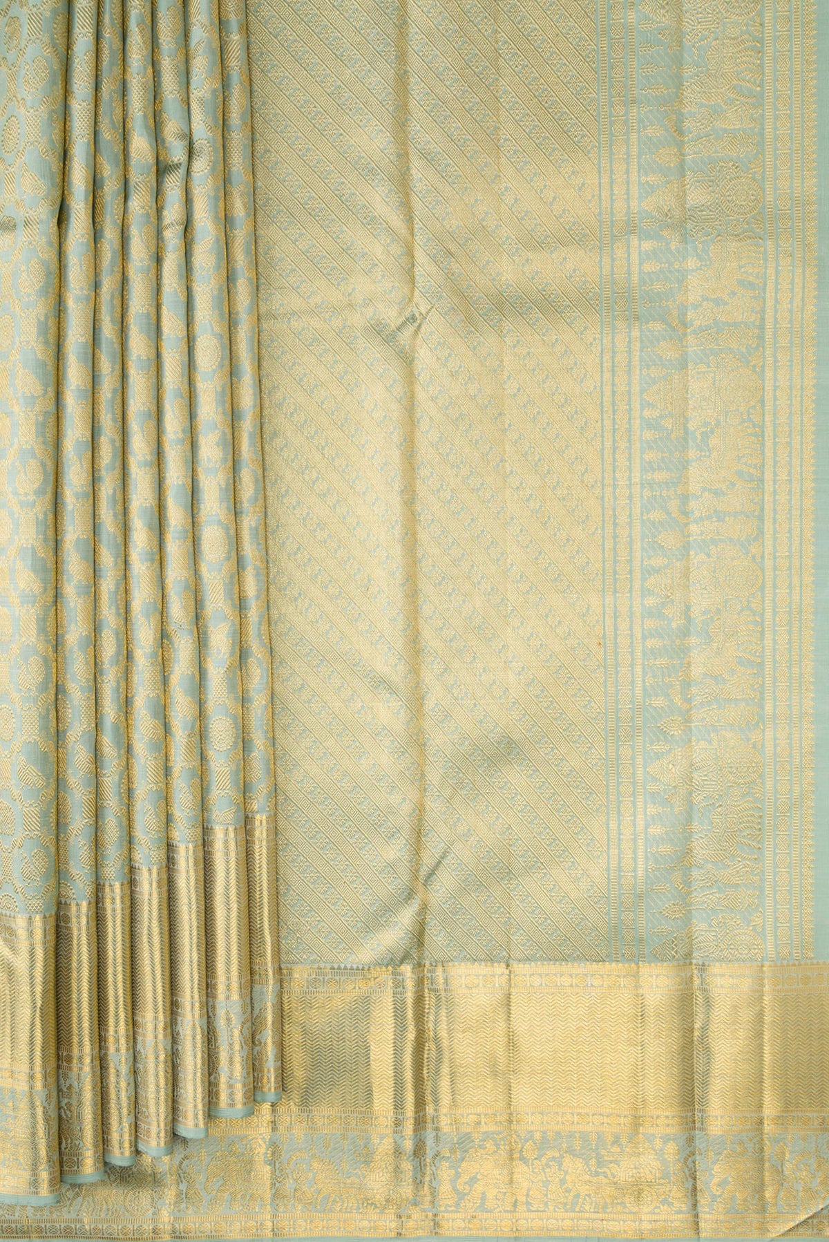 Pleats and pallu of Pista Green Dual Tone Kanchipuram Silk Saree with Zari Brocade on the body and Zari Border. 