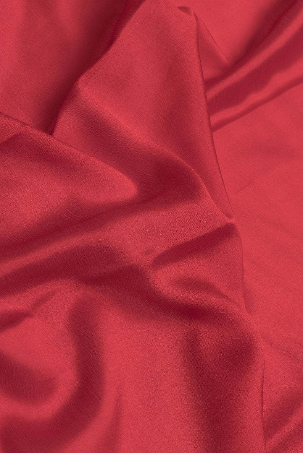 Close up of Red Dual Tone Mysore Silk Saree with Plain Body and Zari Border.  displaying folds