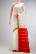 Off White Dual Tone Mysore Silk Saree with Plain Body and Zari Border.  displayed on a mannequin