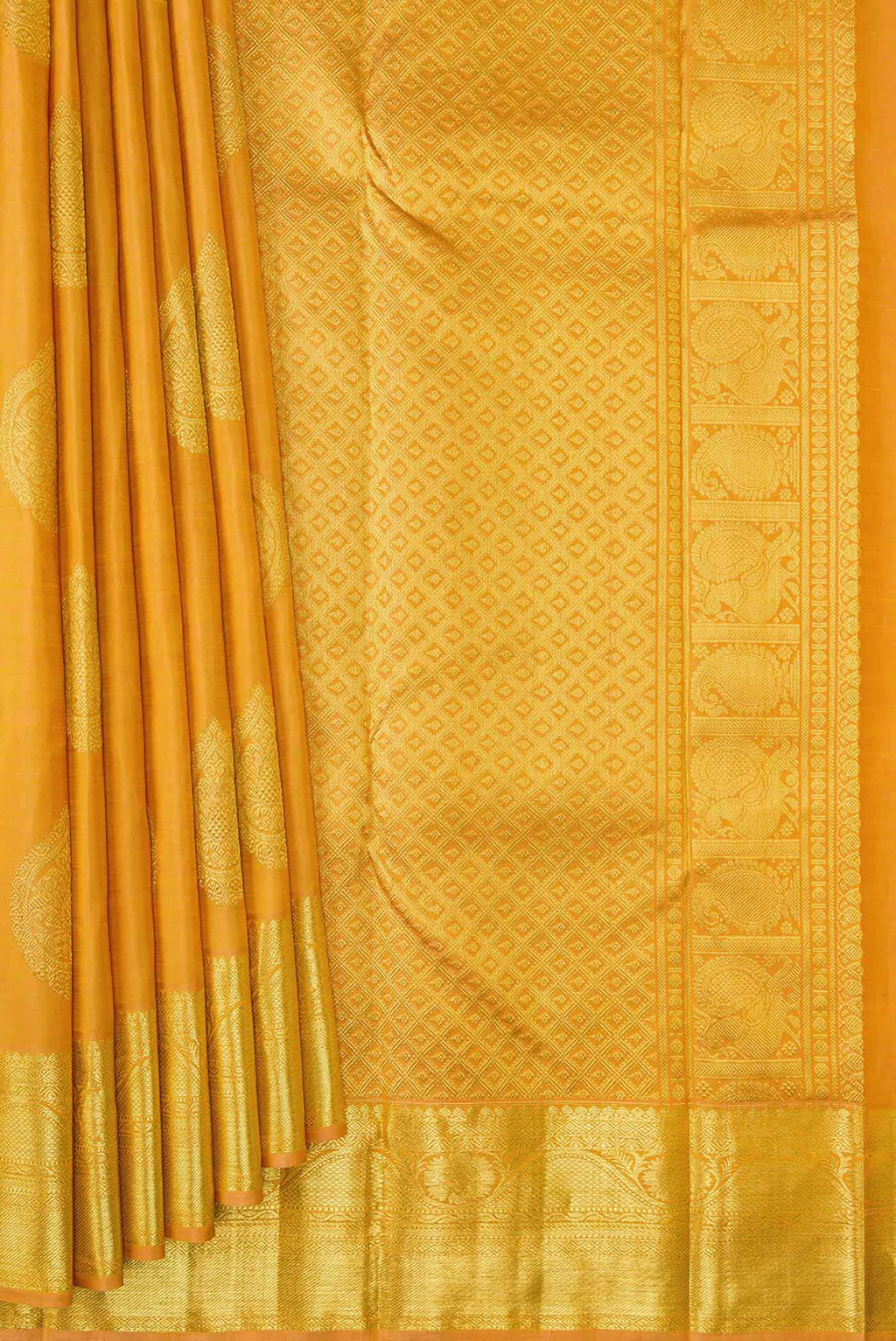 Pleats and pallu of Golden Peach Dual Tone Kanjivaram Silk Saree with Zari Butta on the body and Zari Border. 