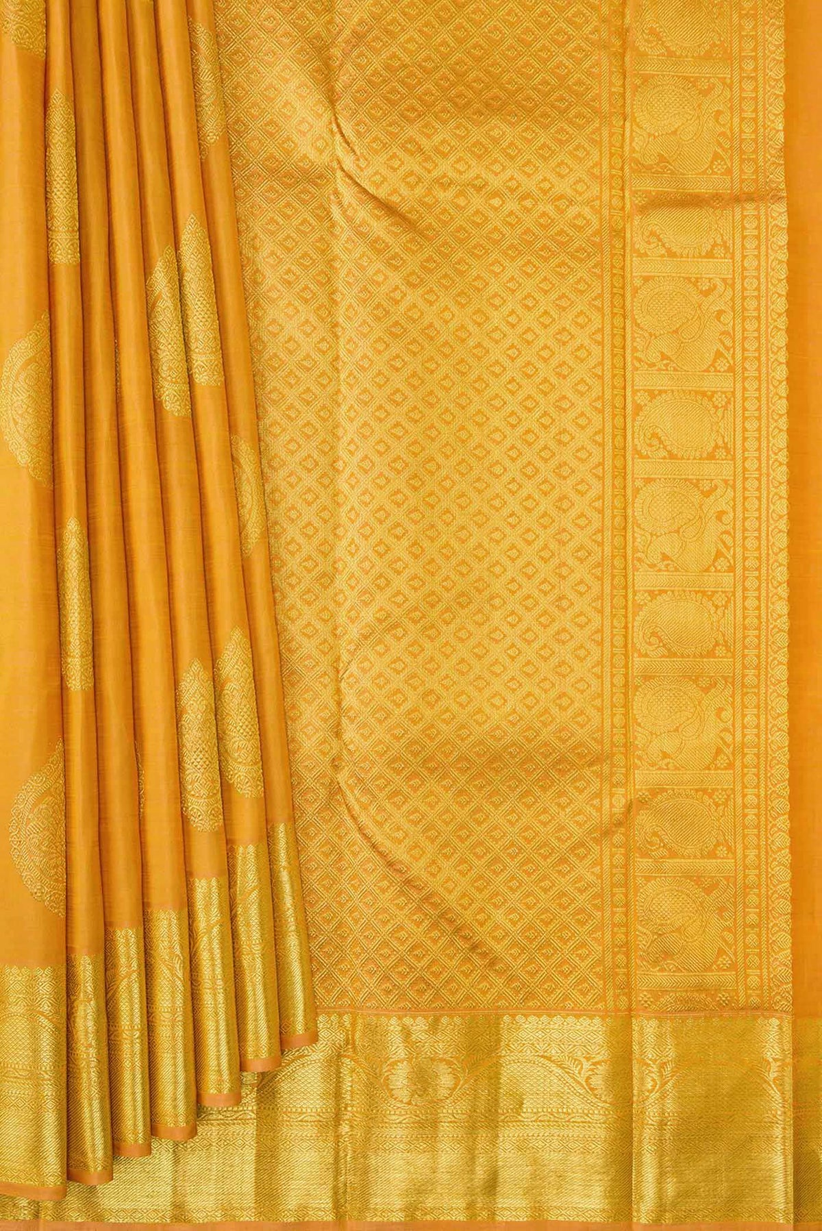 Pleats and pallu of Golden Peach Dual Tone Kanjivaram Silk Saree with Zari Butta on the body and Zari Border. 