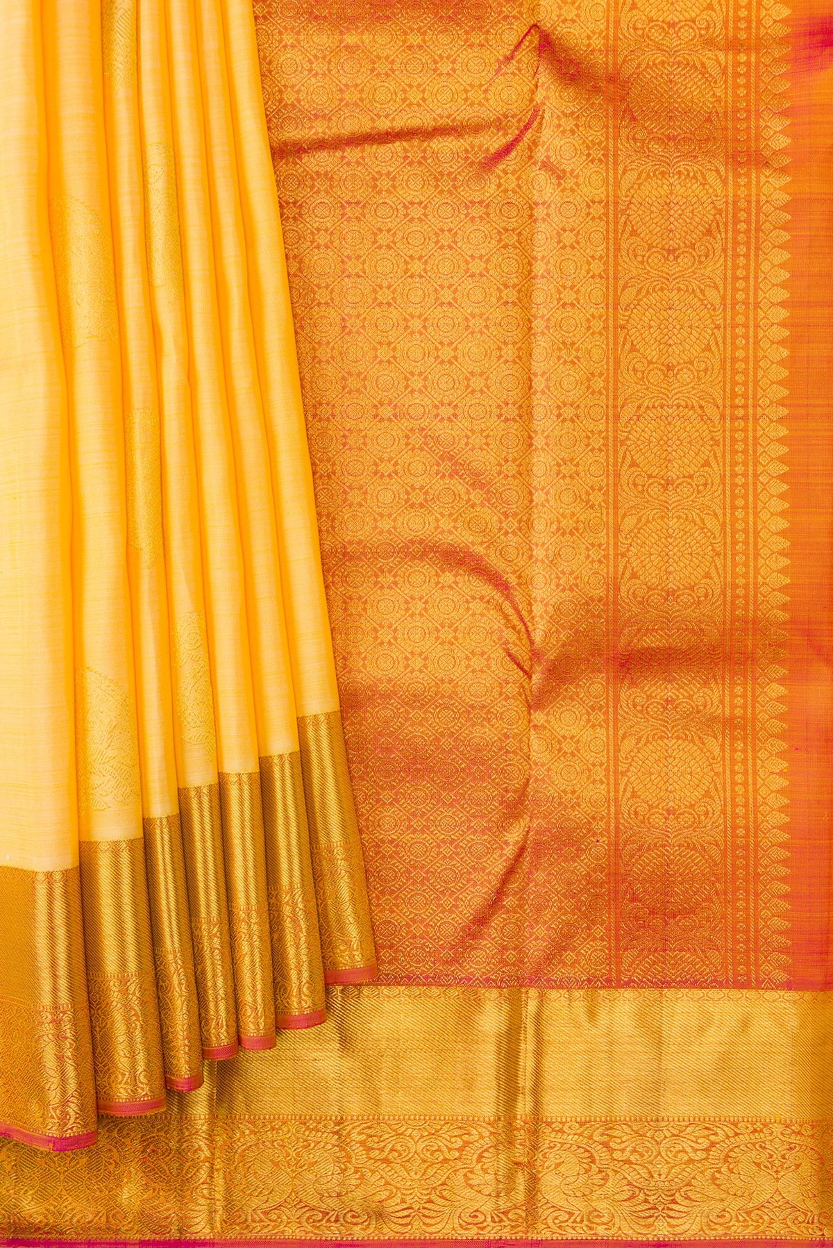 Pleats and pallu of Sandal Dual Tone Kanjivaram Silk Saree with Zari Butta on the body and Zari Border. 