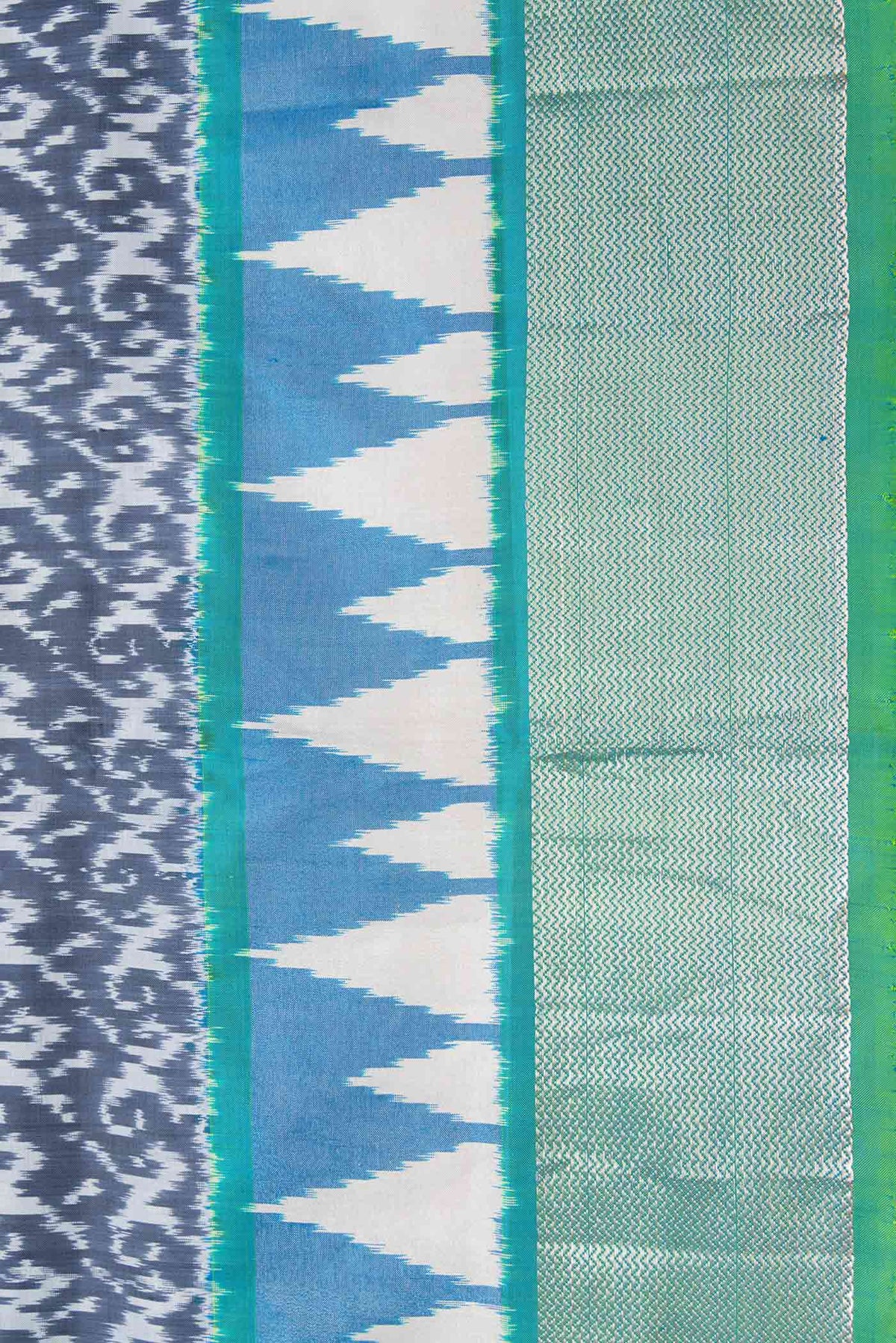 Border image of Grey Dual Tone Double Ikat Saree with Ikat Print on the body and Ikat Border