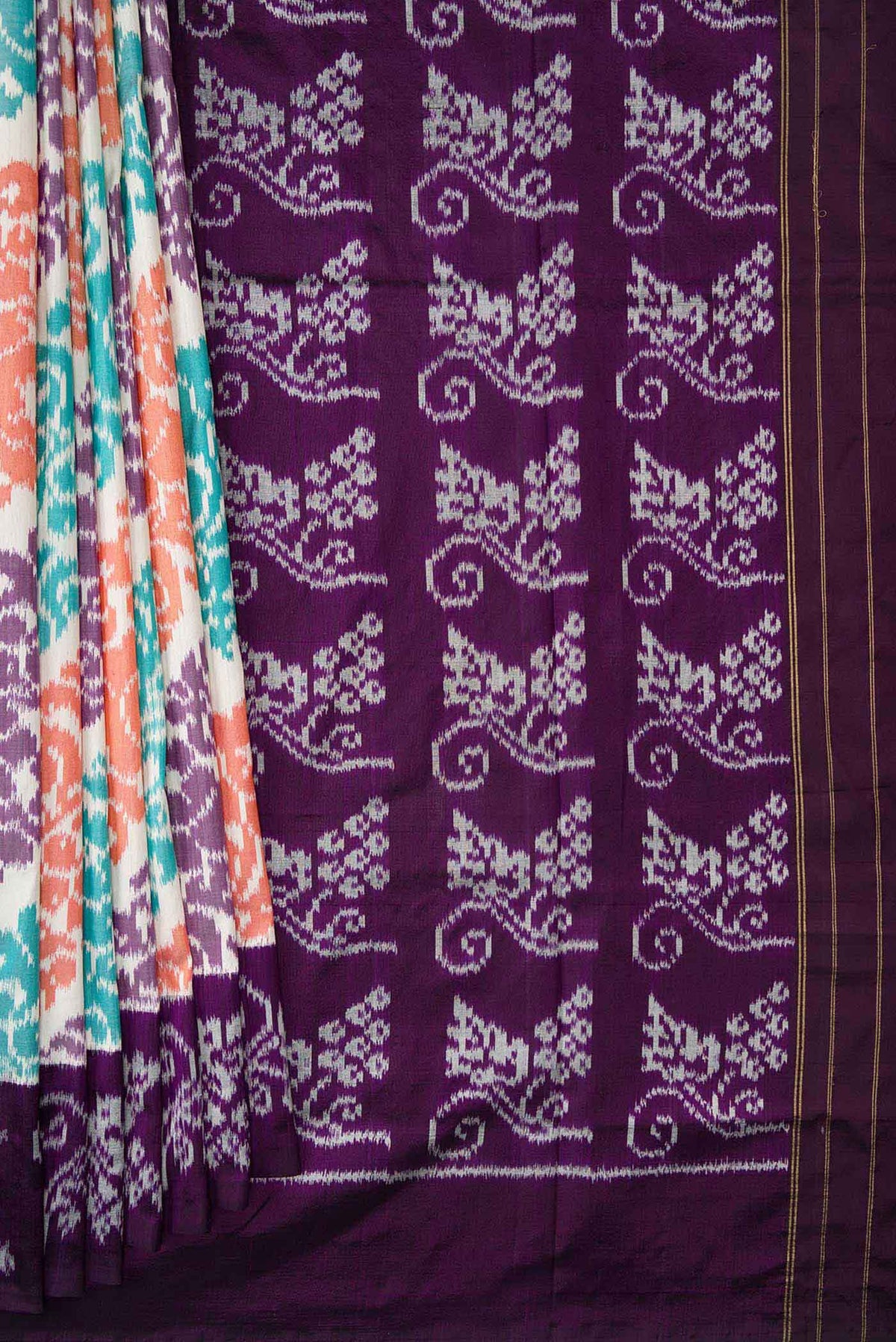 Pleats and pallu of Off White Dual Tone Double Ikat Saree with Ikat Print on the body and Plain Border. 