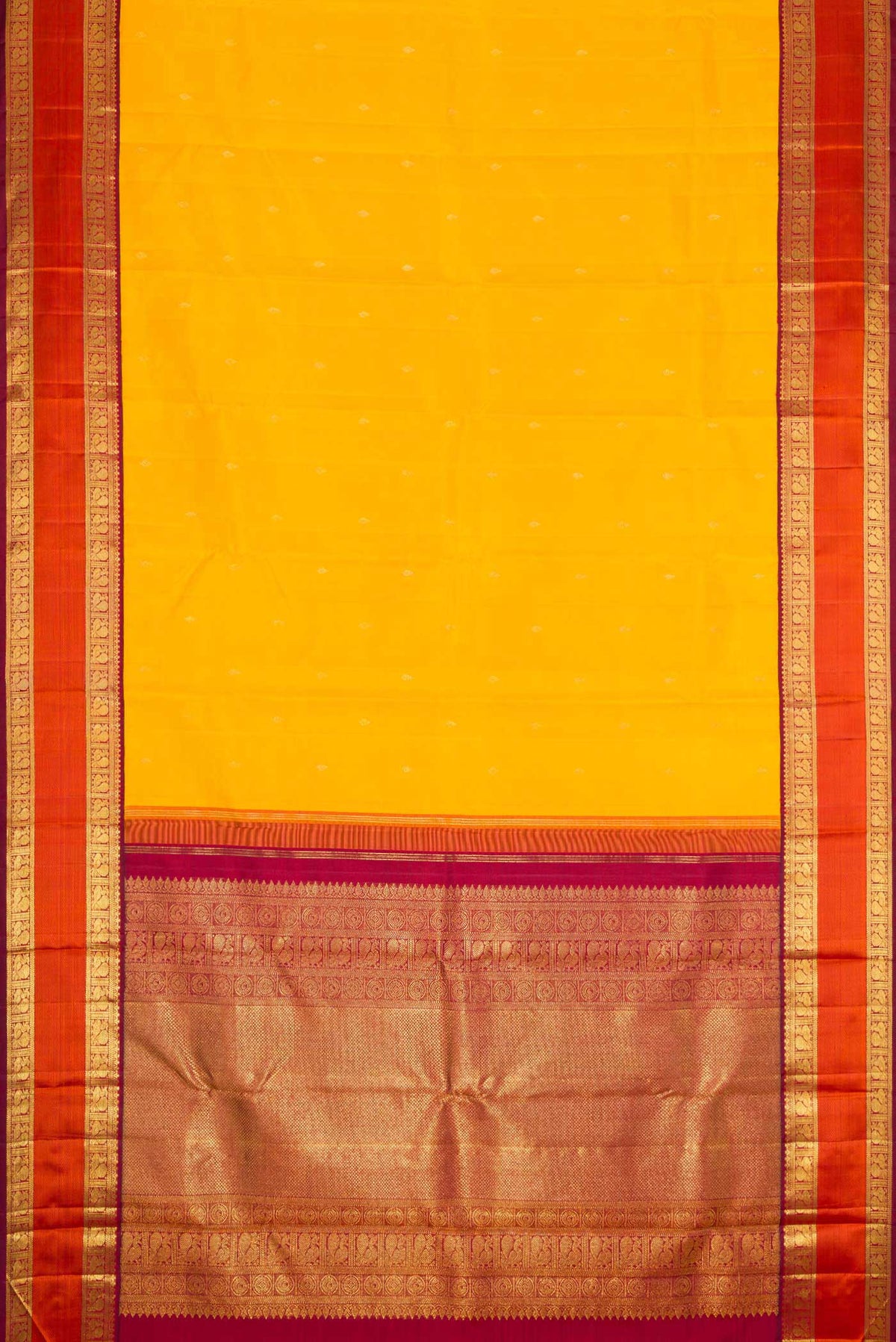 Flat view of Pure Silk Pure Zari Mustard Dual Tone Kanchipuram Saree with Zari Butta on the body and Zari And Thread Border