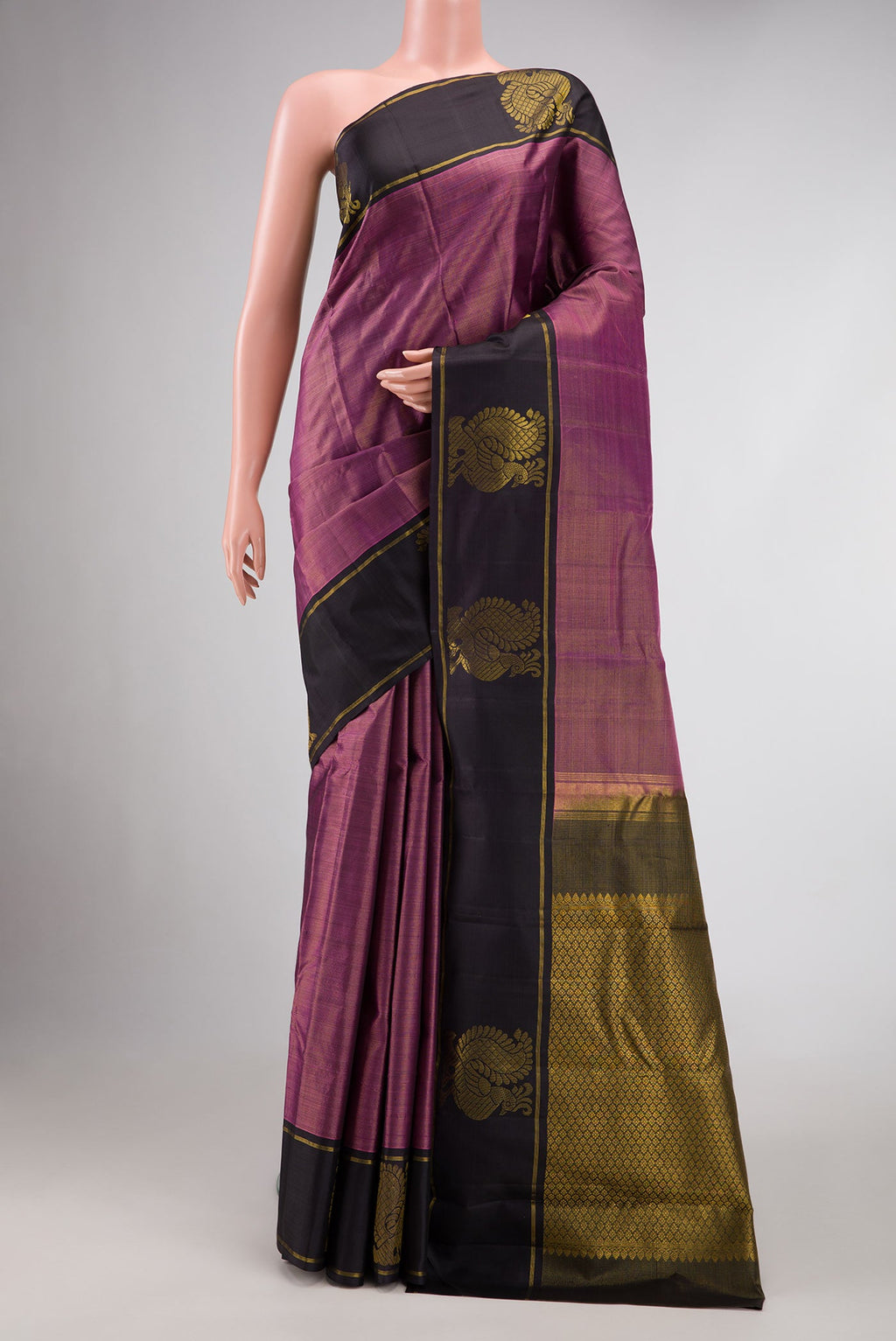 Pink Dual Tone Kanjivaram Silk Saree with Zari Butta on the body and Zari Border.  displayed on a mannequin