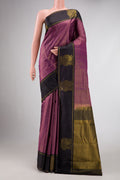 Pink Dual Tone Kanjivaram Silk Saree with Zari Butta on the body and Zari Border.  displayed on a mannequin