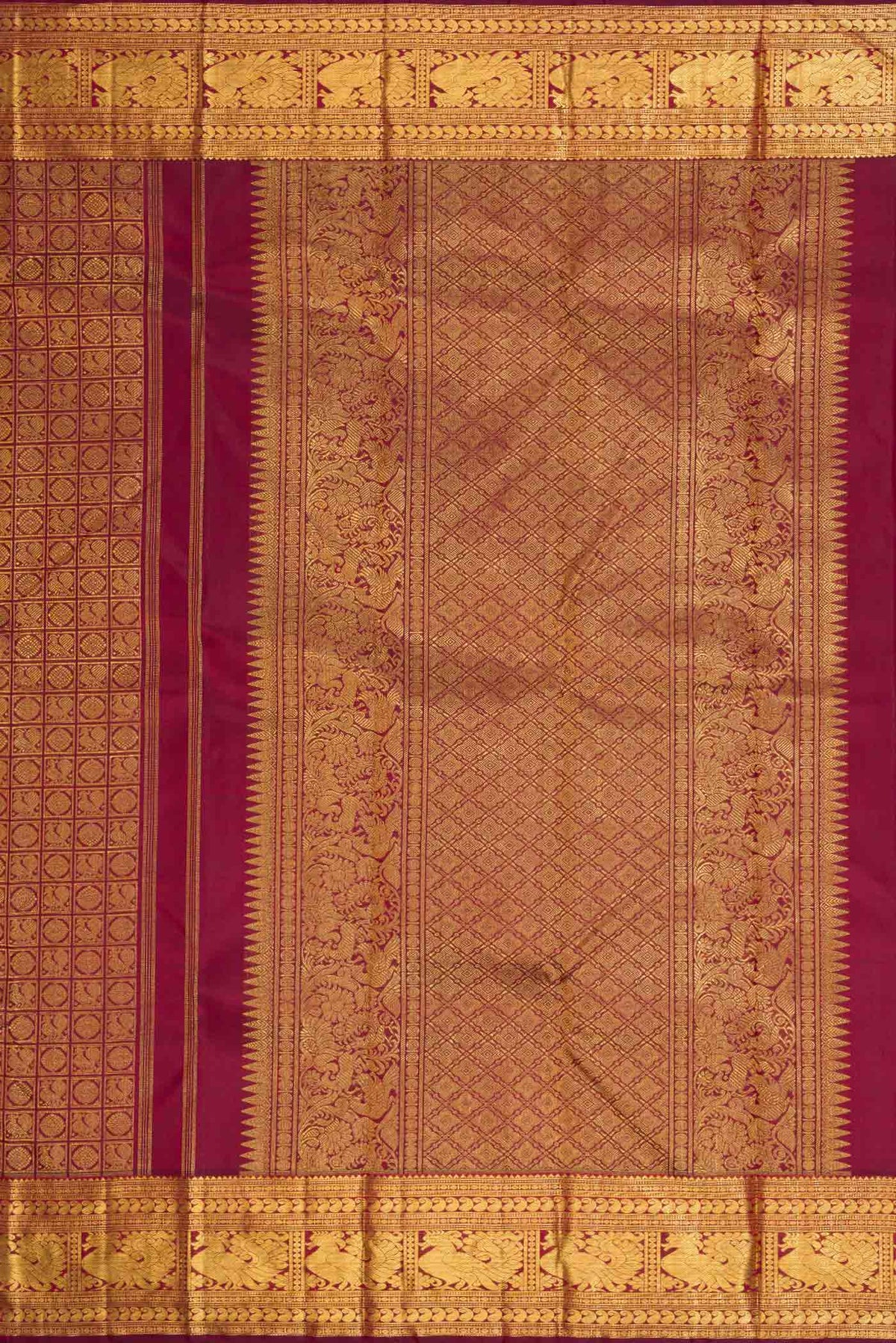 Close up image of the pallu of Pure Silk Pure Zari Maroon Dual Tone Kanchipuram Saree with Zari Brocade on the body and Zari Border