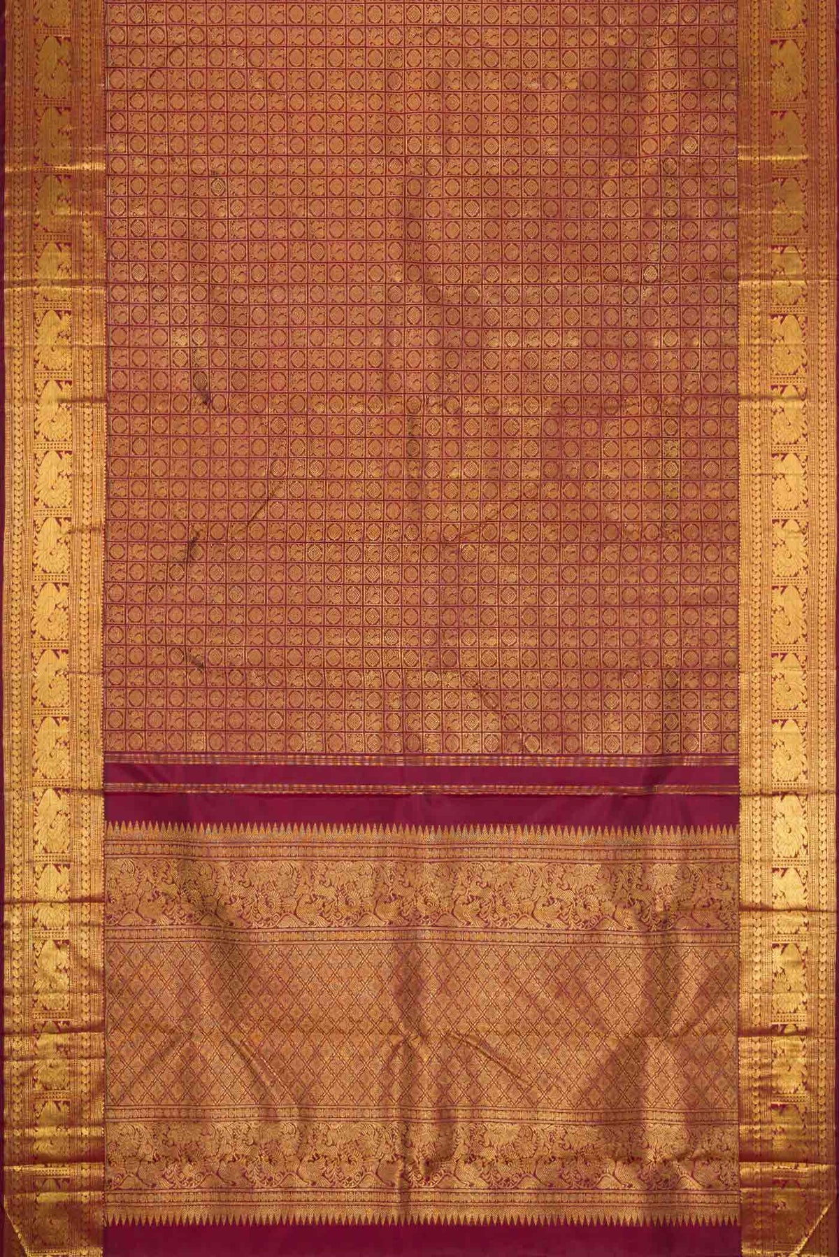 Flat view of Pure Silk Pure Zari Maroon Dual Tone Kanchipuram Saree with Zari Brocade on the body and Zari Border