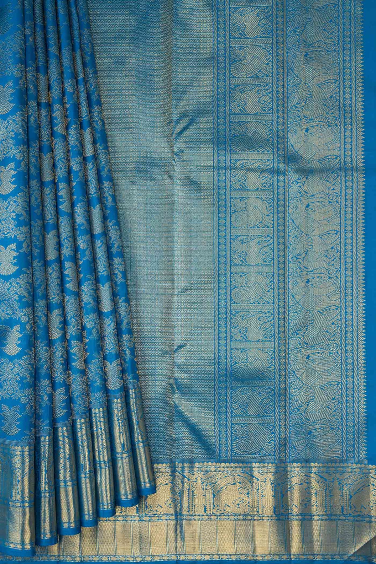 Pleats and pallu of Pure Silk Pure Zari Peacock Blue Dual Tone Kanchipuram Saree with Zari Brocade on the body and Zari Border
