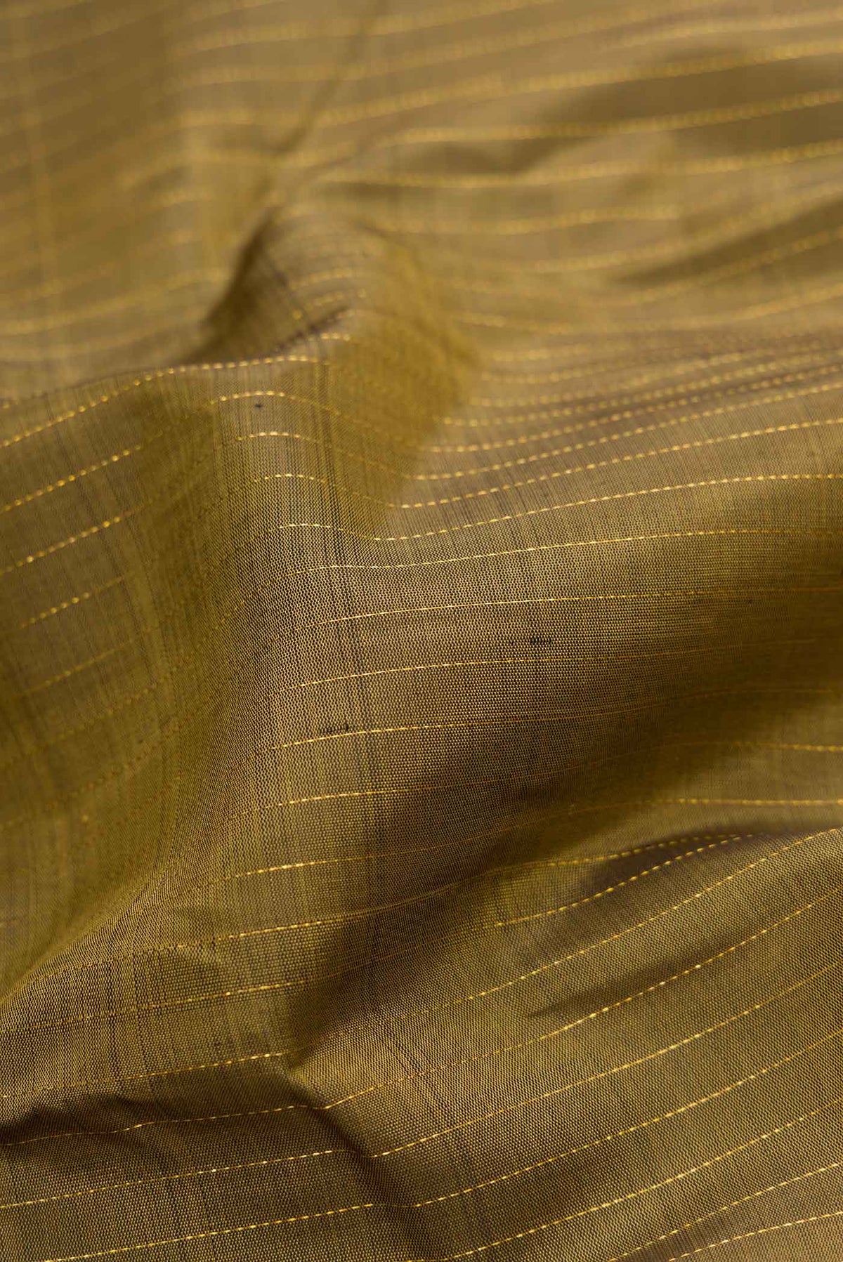 Close up of Mehandi Green Dual Tone Kanchipuram Silk Saree with Stripes on the body and Zari Border.  displaying folds