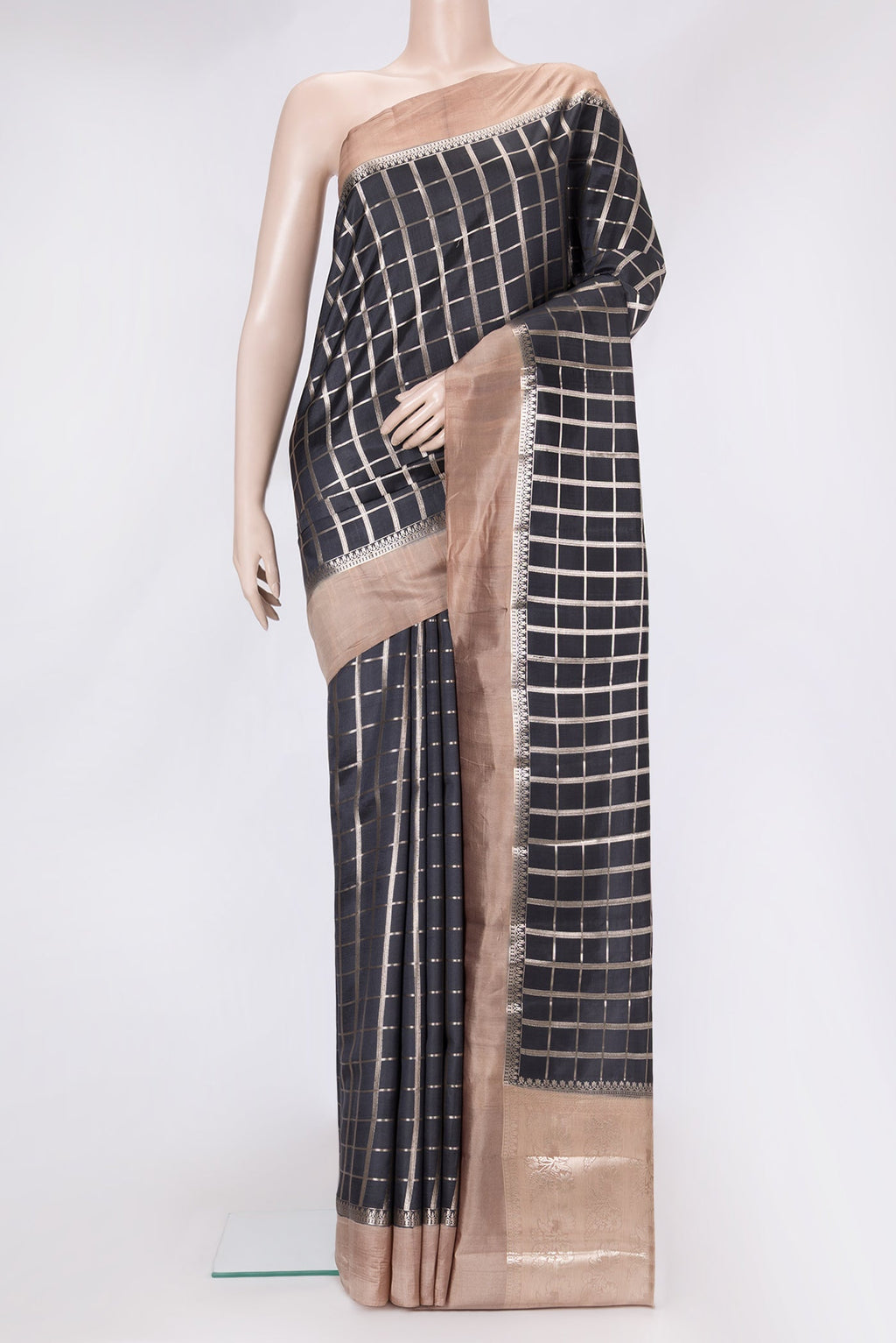 Black Dual Tone Tussar Silk Saree with Checked design on the body and Zari Border.  displayed on a mannequin