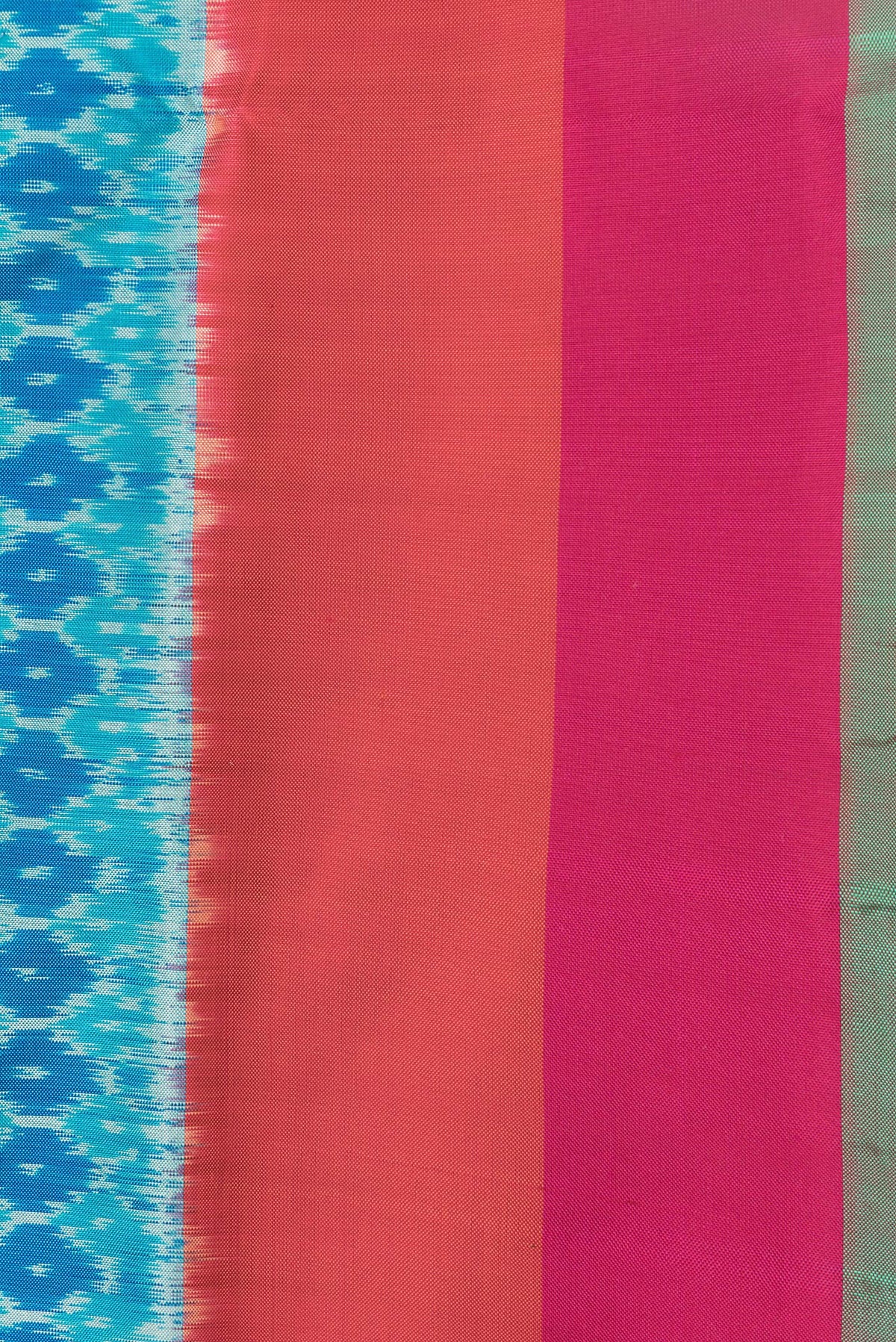 Border image of Sky Blue Dual Tone Double Ikat Saree with Ikat Print on the body and Plain Border. 