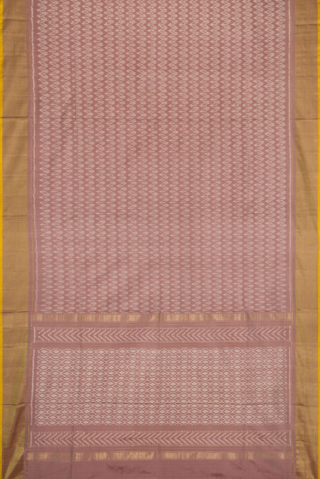 Flat view of Brown Dual Tone Double Ikat Saree with Ikat Print on the body and Zari Border. 