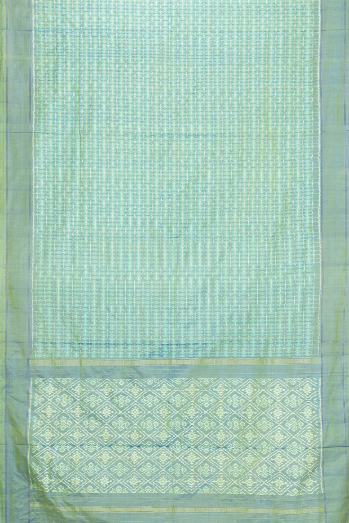 Flat view of Green Dual Tone Double Ikat Saree with Ikat Print on the body and Plain Border. 