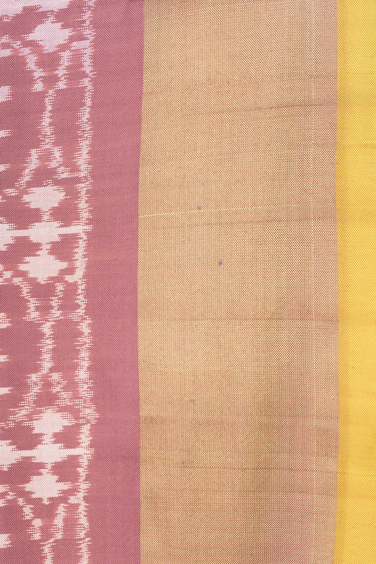Border image of Brown Dual Tone Double Ikat Saree with Ikat Print on the body and Zari Border. 