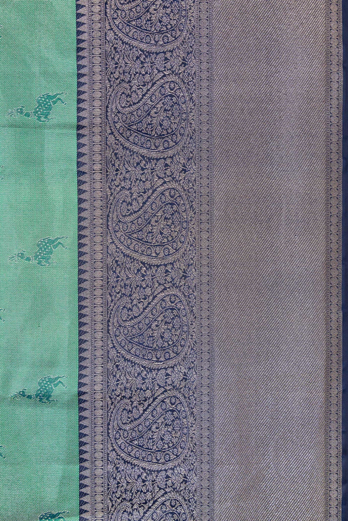 Border image of Green Dual Tone Kanjivaram Tissue Silk Saree with Zari Brocade on the body and Fancy Border. 