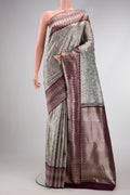 Light Green Dual Tone Kanjivaram Tissue Silk Saree with Zari Brocade on the body and Fancy Border.  displayed on a mannequin