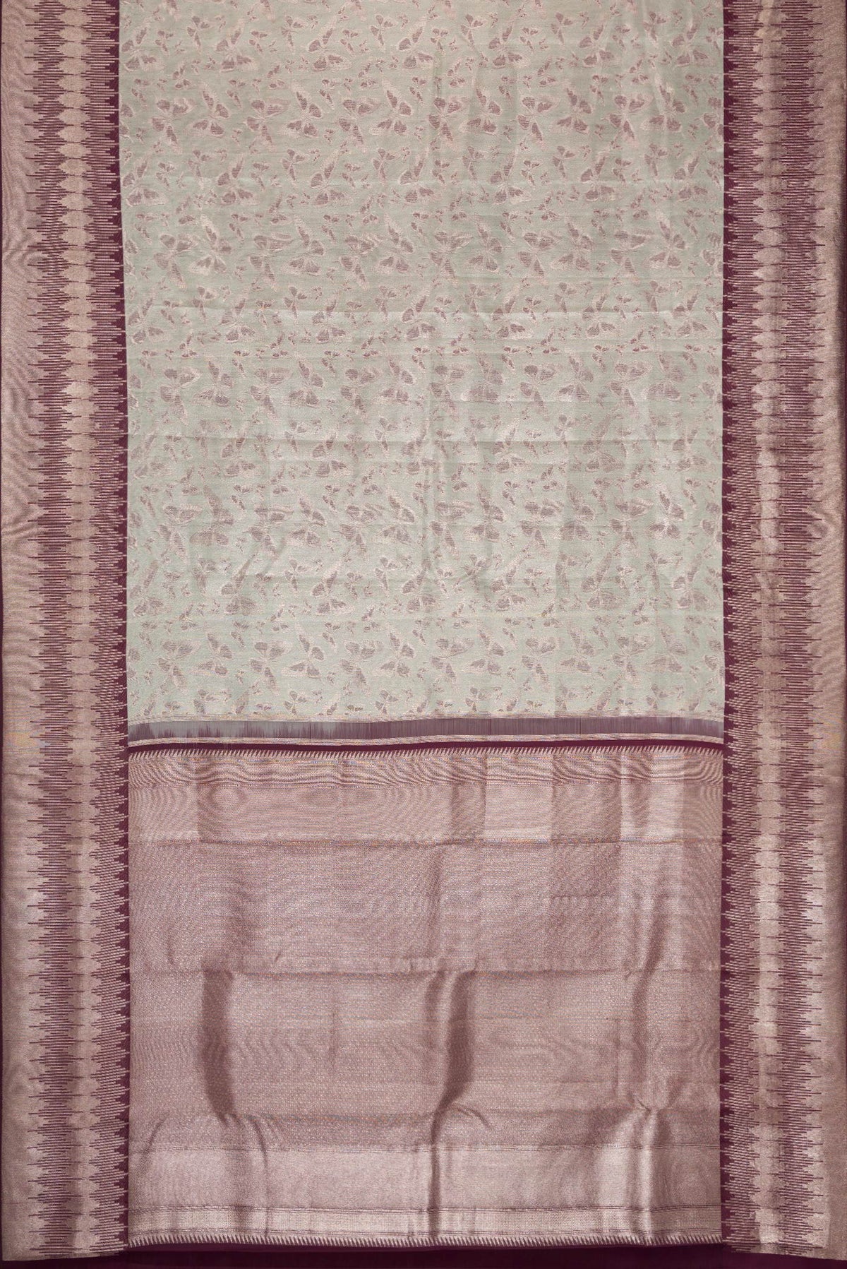 Flat view of Light Green Dual Tone Kanjivaram Tissue Silk Saree with Zari Brocade on the body and Fancy Border. 