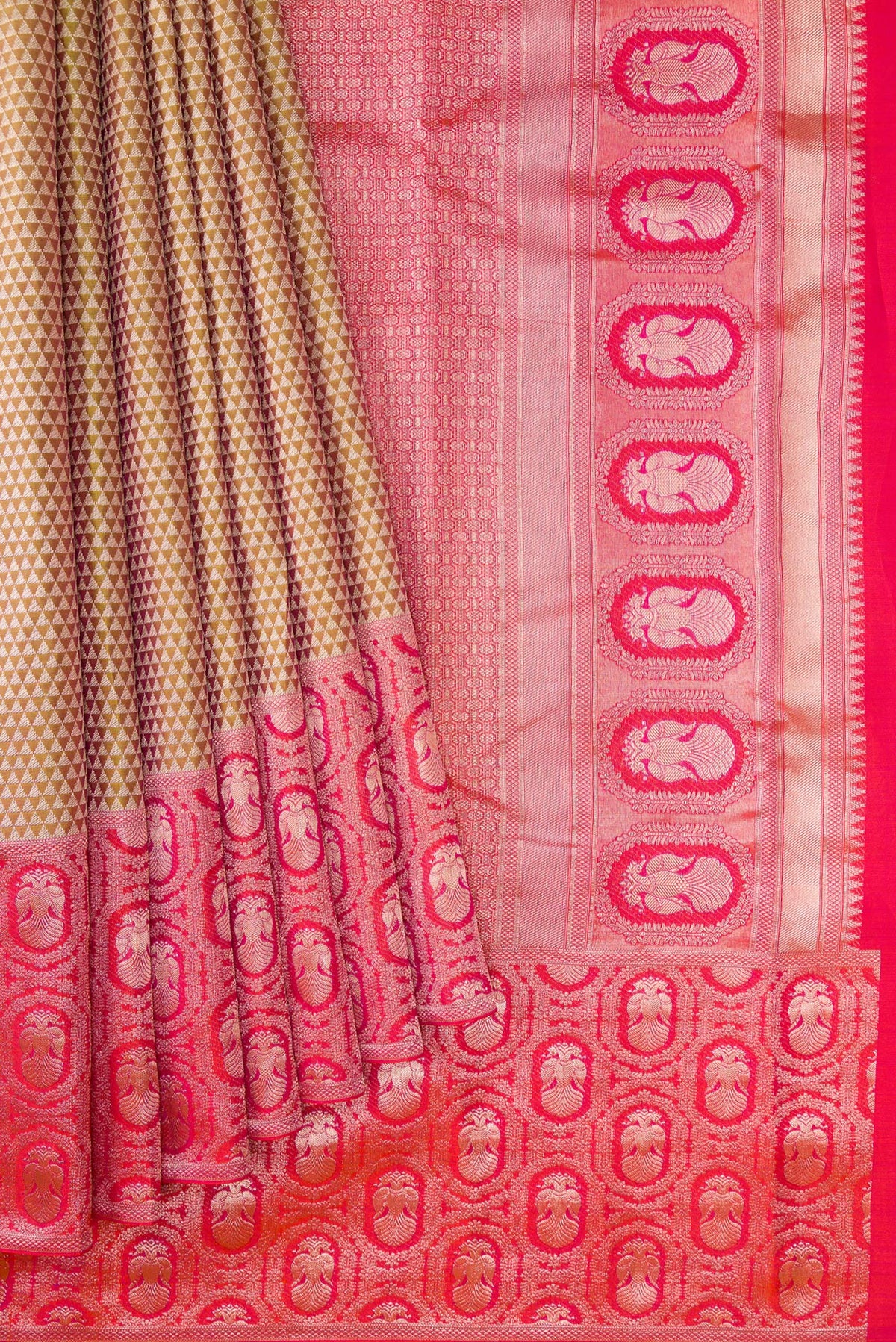 Pleats and pallu of Gold Dual Tone Kanjivaram Tissue Silk Saree with Zari Brocade on the body and Fancy Border. 