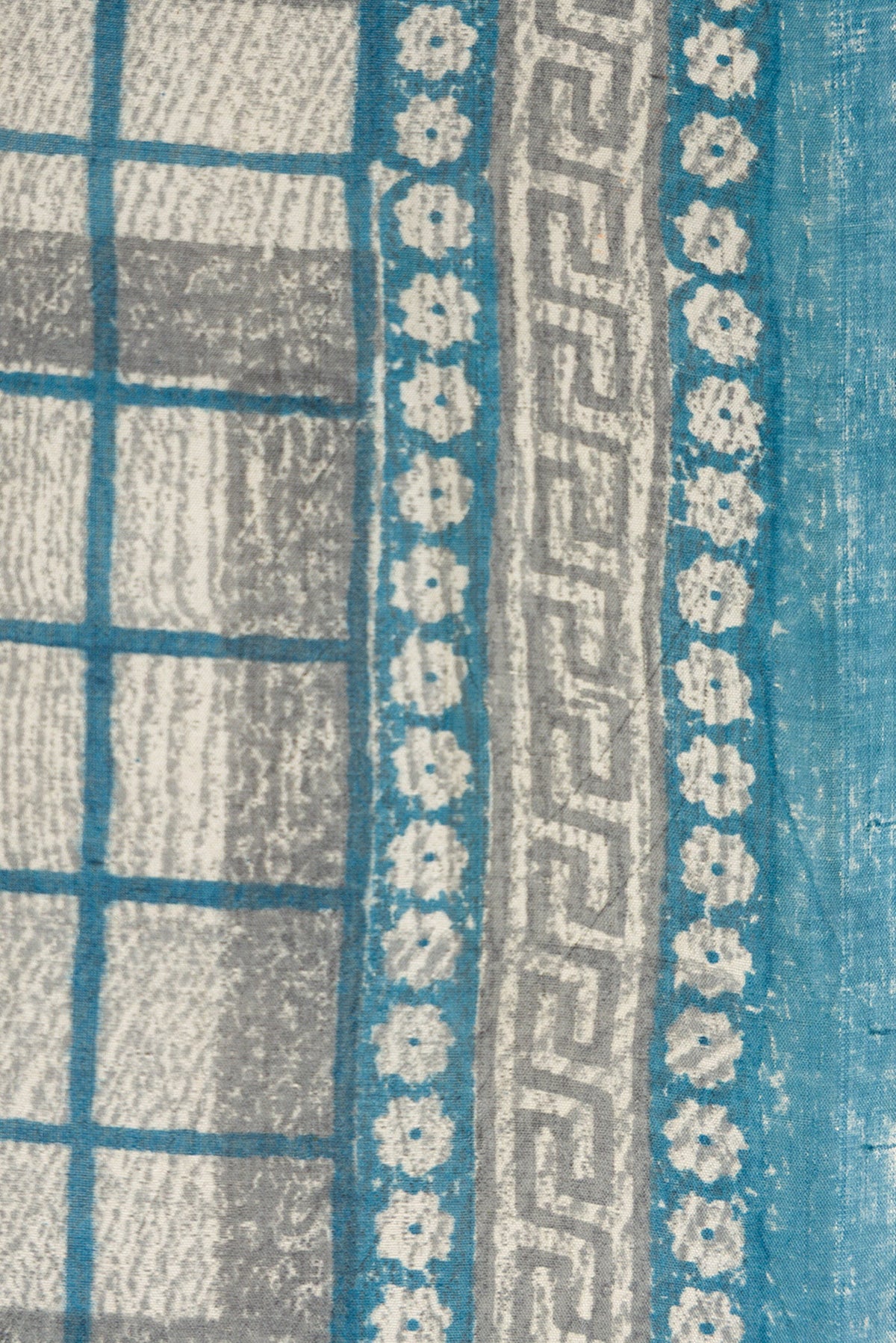 Border image of Grey Dual Tone Tussar Silk Saree with Checked design on the body and Fancy Border. 