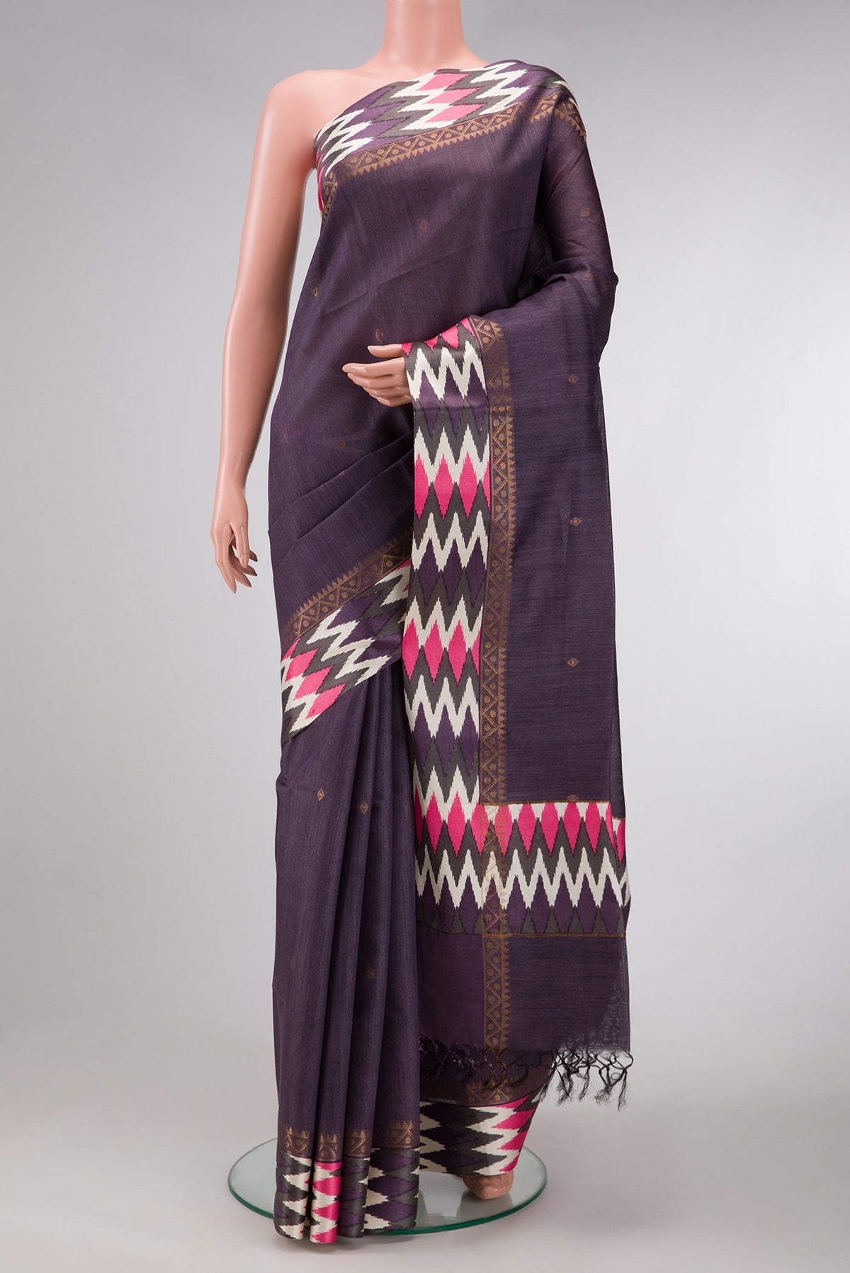 Violet Dual Tone Tussar Silk Saree with Zari Butta on the body and Ikat Border.  displayed on a mannequin