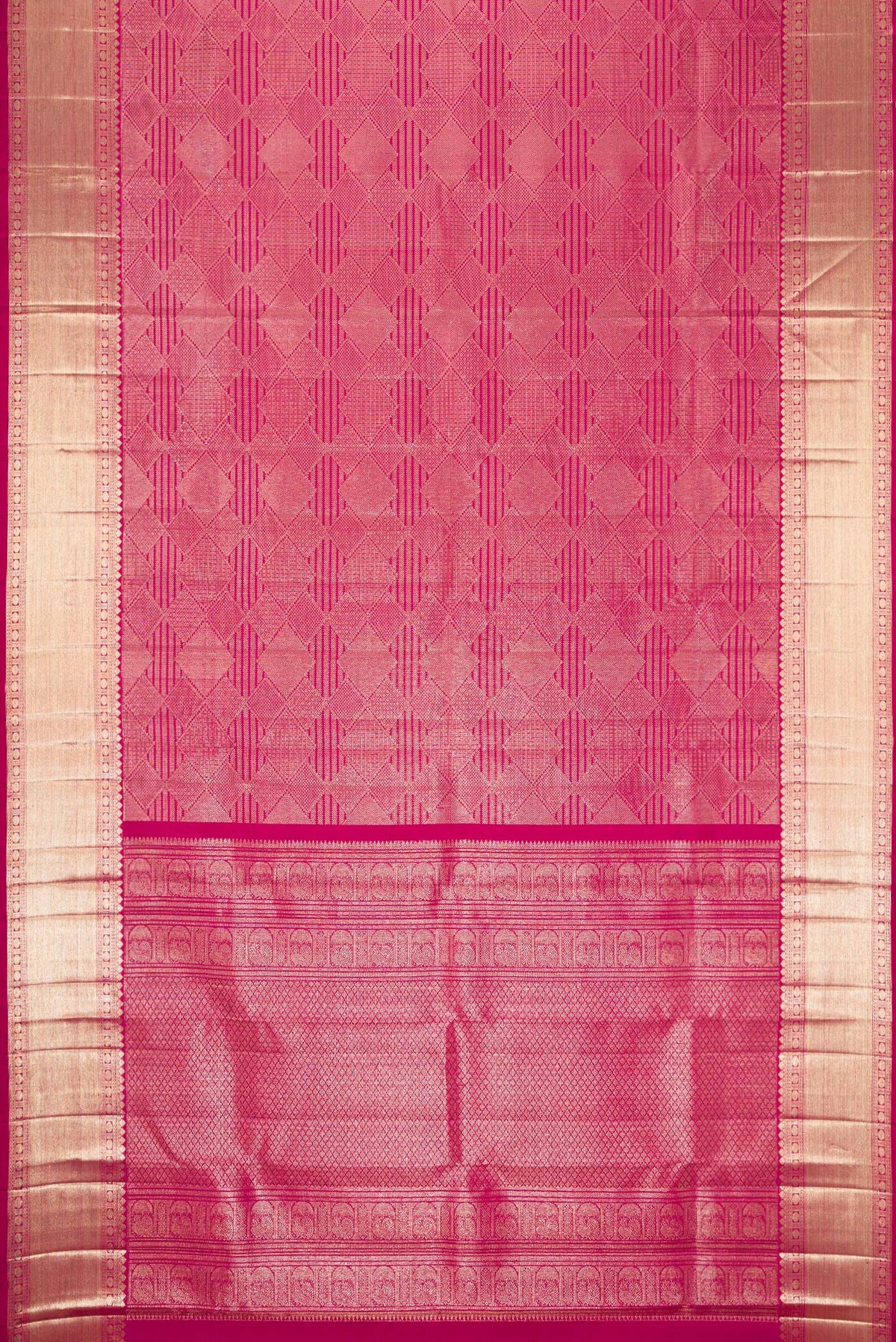 Flat view of Magenta Dual Tone Kanchipuram Silk Saree with Zari Brocade on the body and Zari Border. 