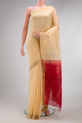 Sandal Silk Cotton Saree with Zari Butta on the body and Zari Border.  displayed on a mannequin