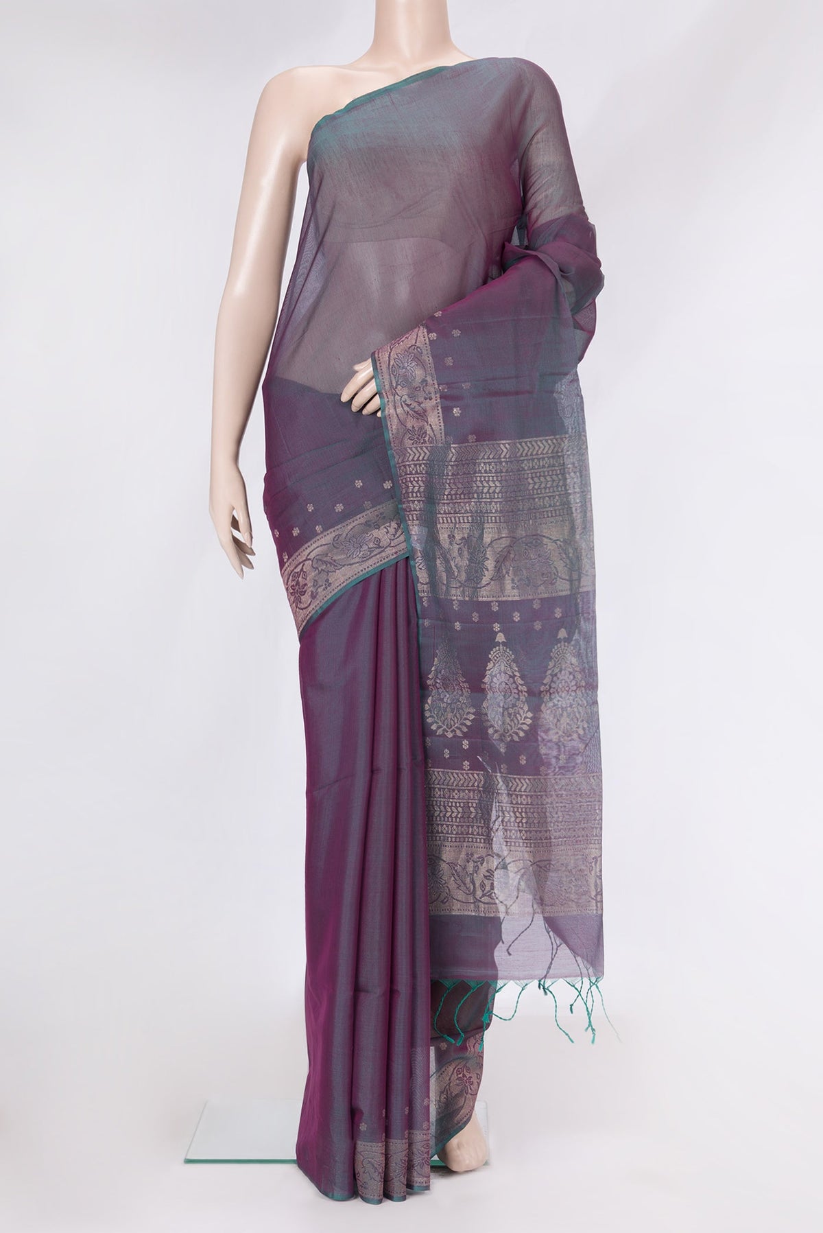 Peacock Blue Dual Tone Silk Cotton Saree with Zari Butta on the body and Zari Border.  displayed on a mannequin