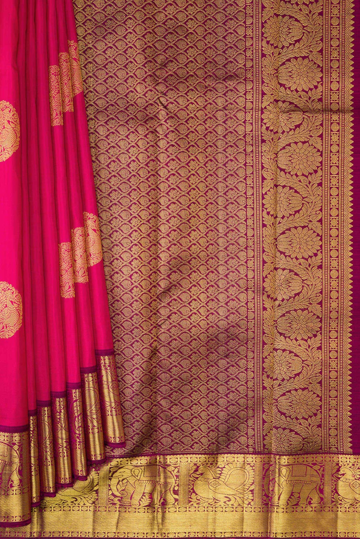 Pleats and pallu of Pink Dual Tone Kanjivaram Silk Saree with Zari Butta on the body and Zari Border. 