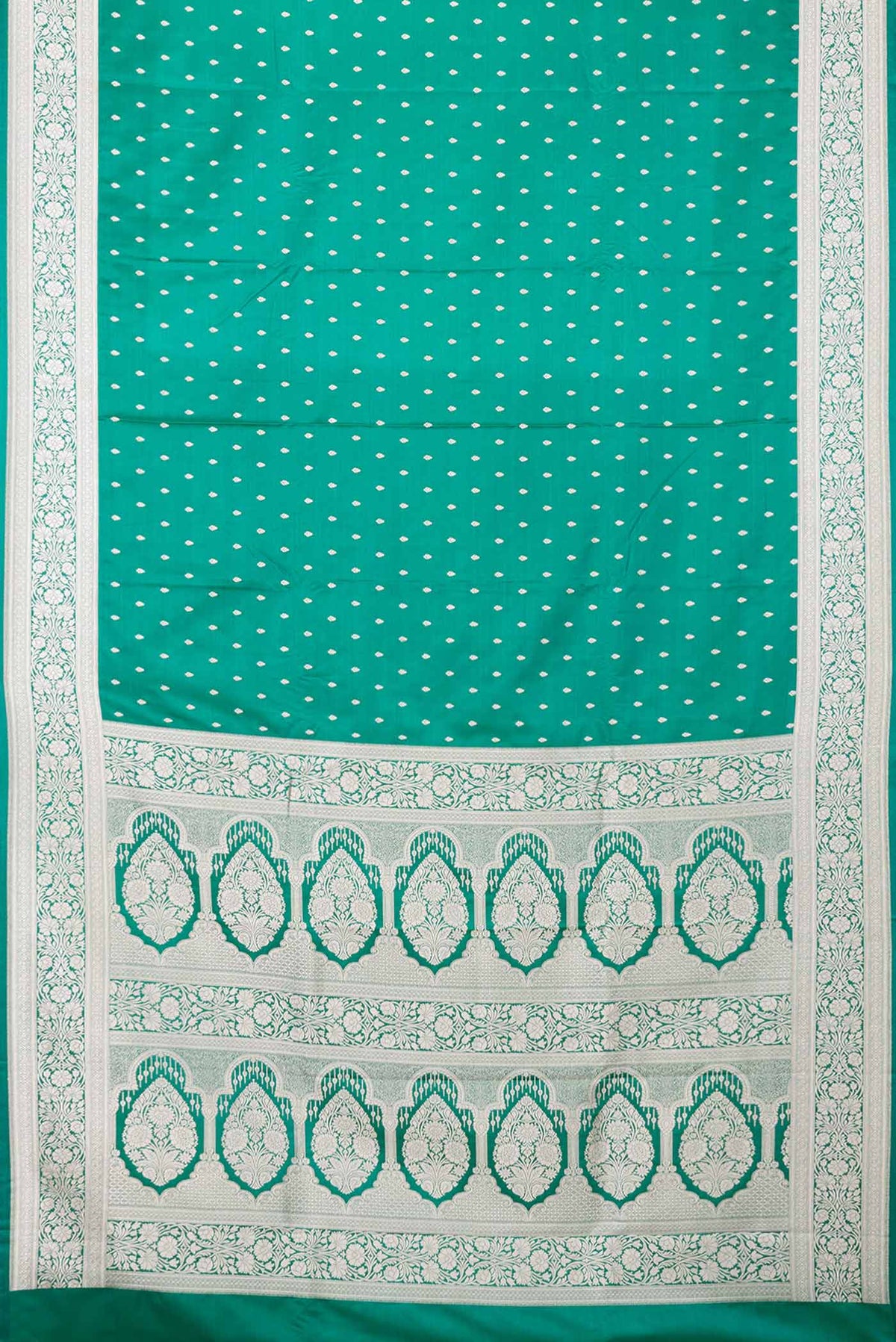 Flat view of Green Dual Tone Blended Banarasi Silk Saree with Zari Butta on the body and Zari Border. 